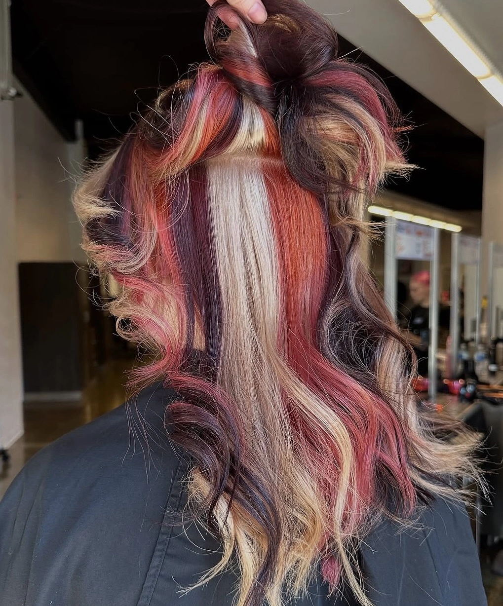 beautiful fall hair colour ideas 2026 Hidden Cinnamon and Blonde Panels for a Playful Reveal