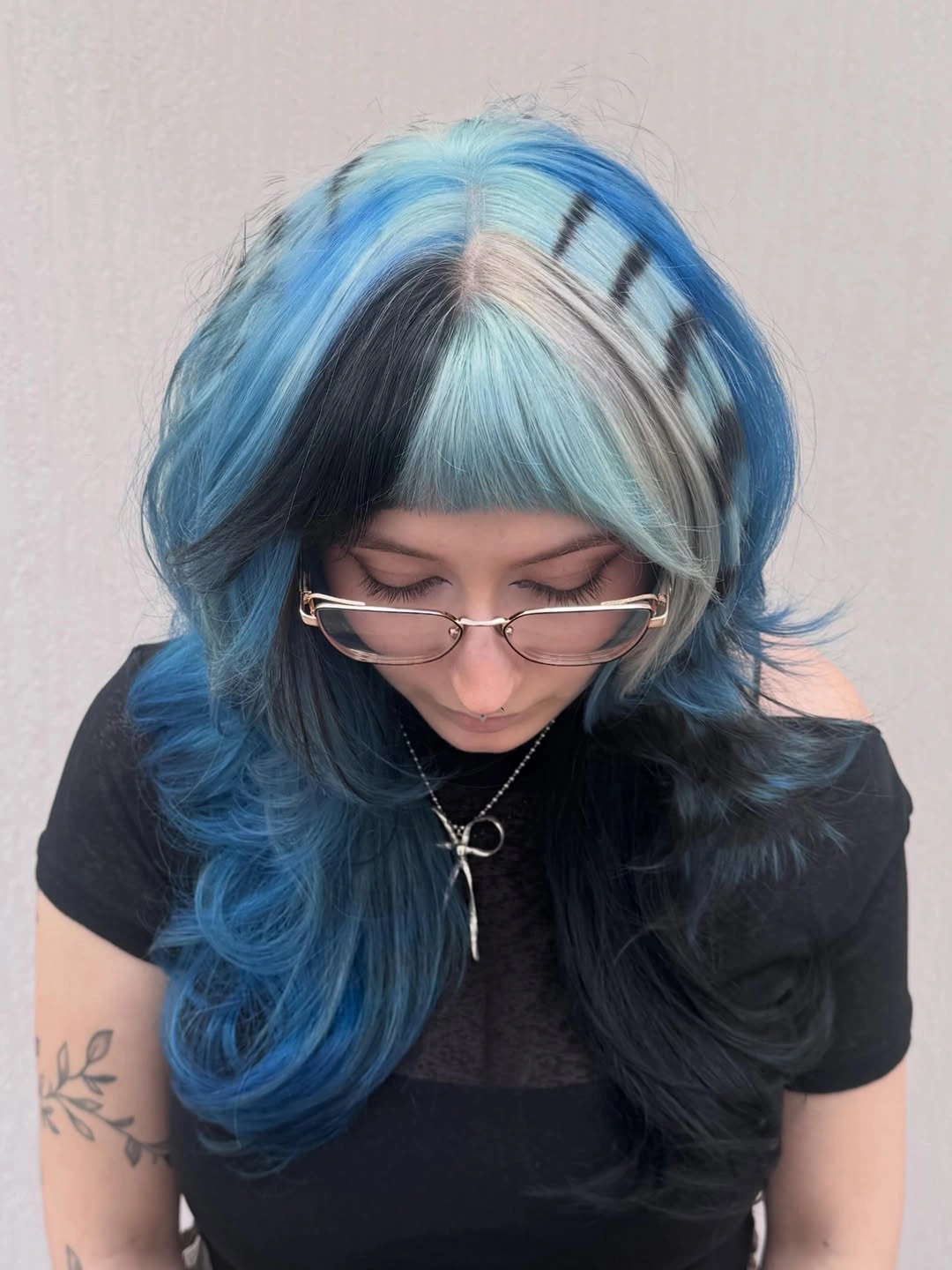 beautiful fall hair colour ideas 2026 Electric Blue Split Color with Graphic Fringe
