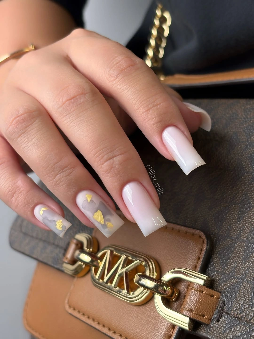 beautiful fall manicure 2026 Milky White Ombre With Marble And Gold Leaf