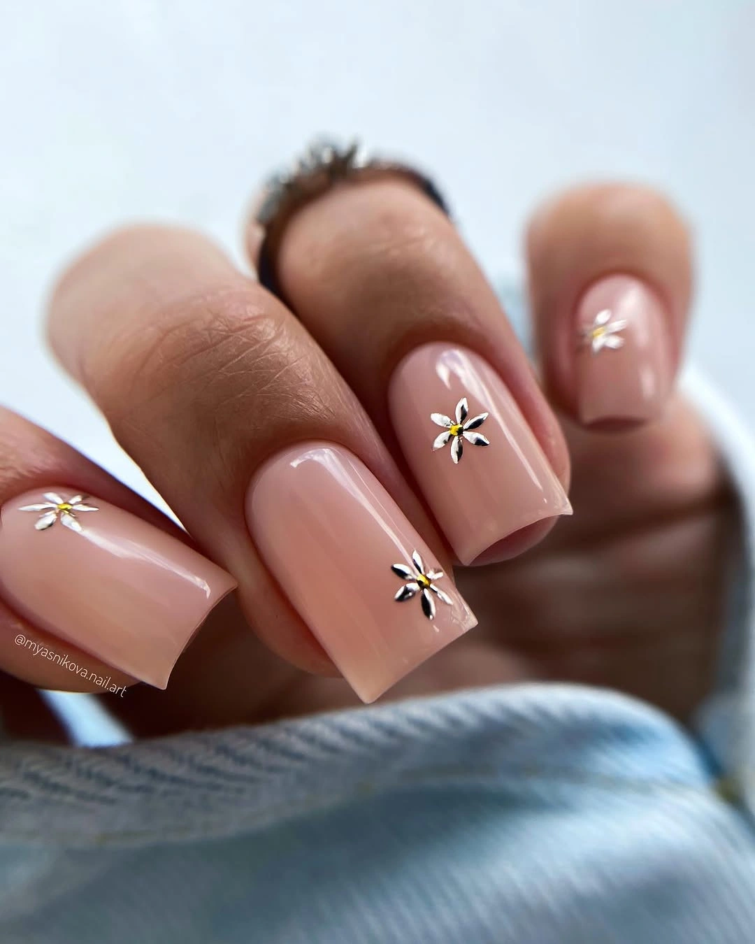 beautiful fall manicure 2026 Soft Nude Daisy Nails
