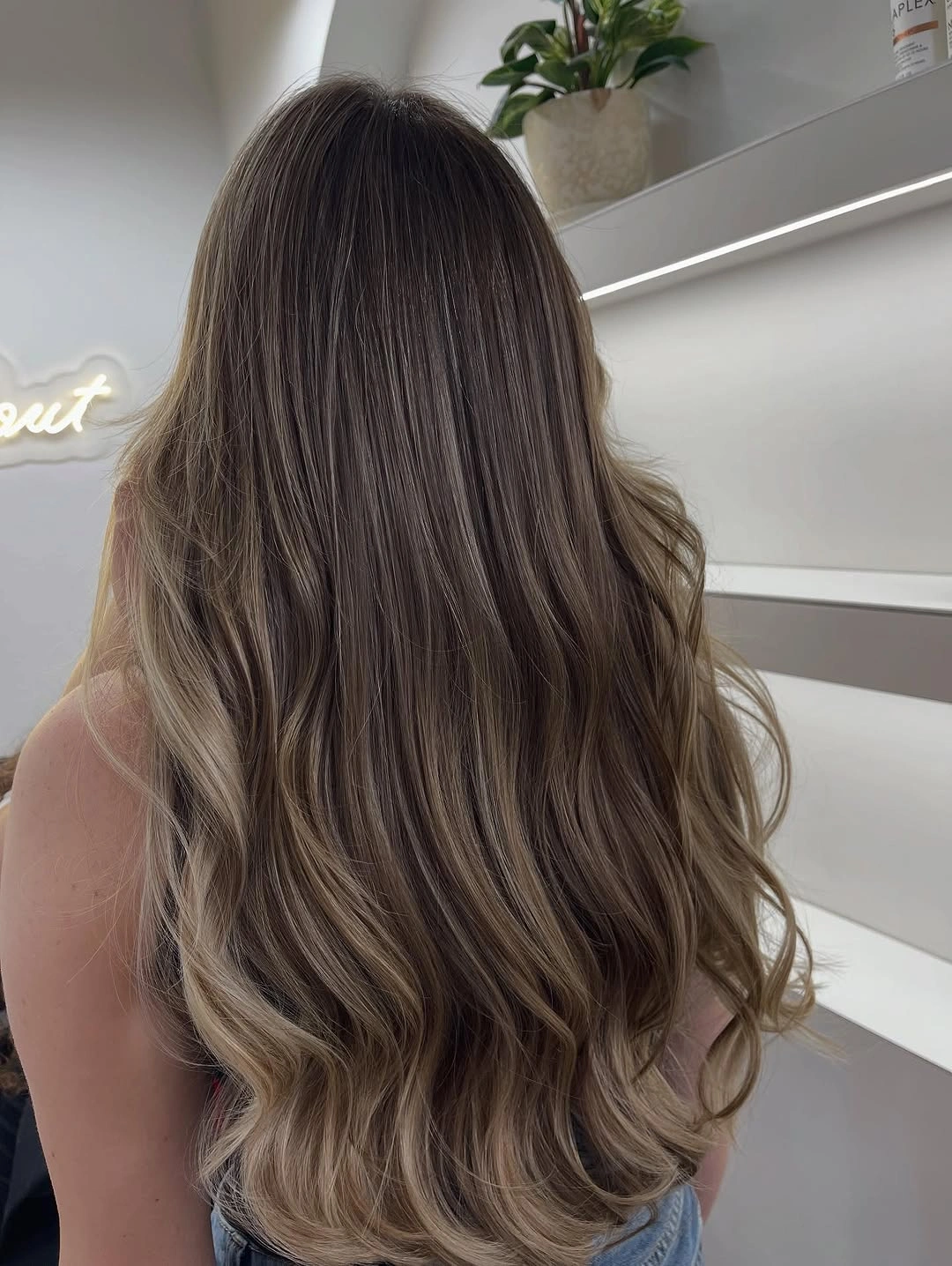 beautiful full head babylights blonde on brown hair Long Brunette Lengths with Seamless Blonde Melt