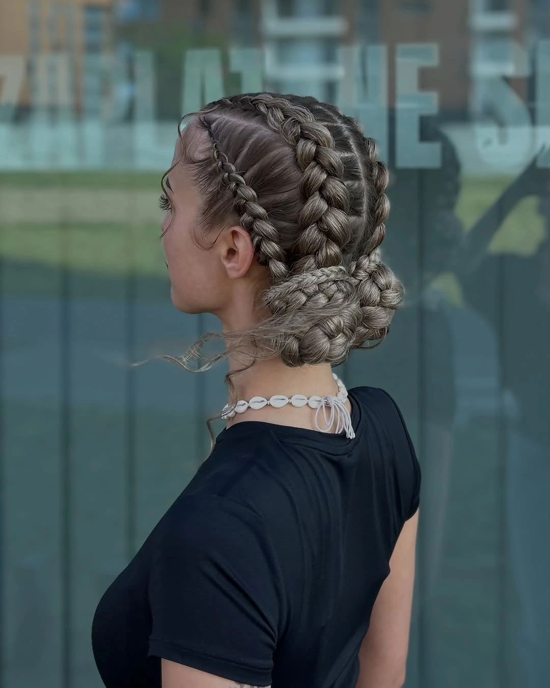 beautiful september hairstyles ideas 2026 Soft Crown Braids Finished With a Low Textured Bun