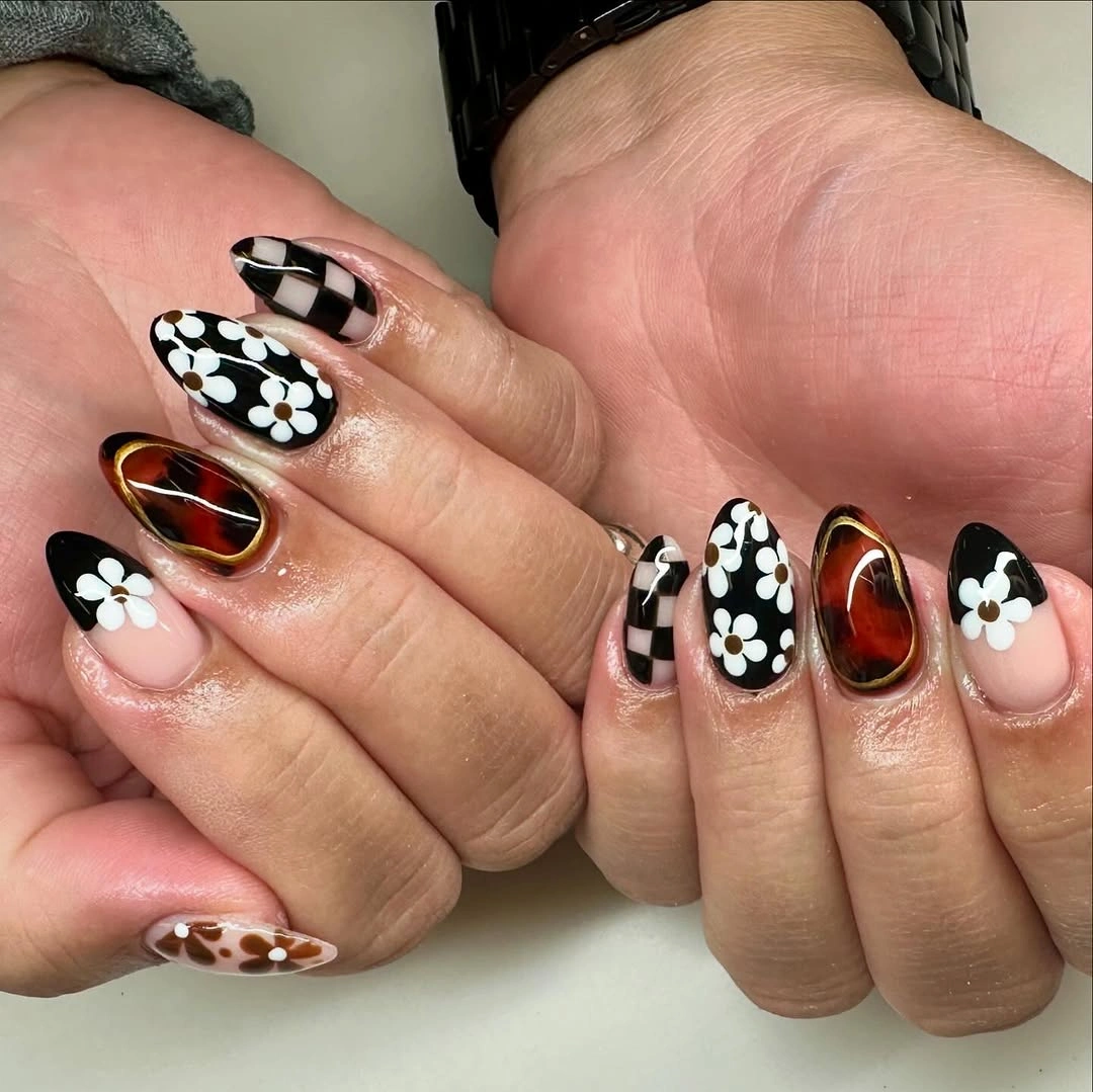 chic september nail art ideas 2026 Retro Florals and Checkerboard Nails with a Chic Autumn Twist