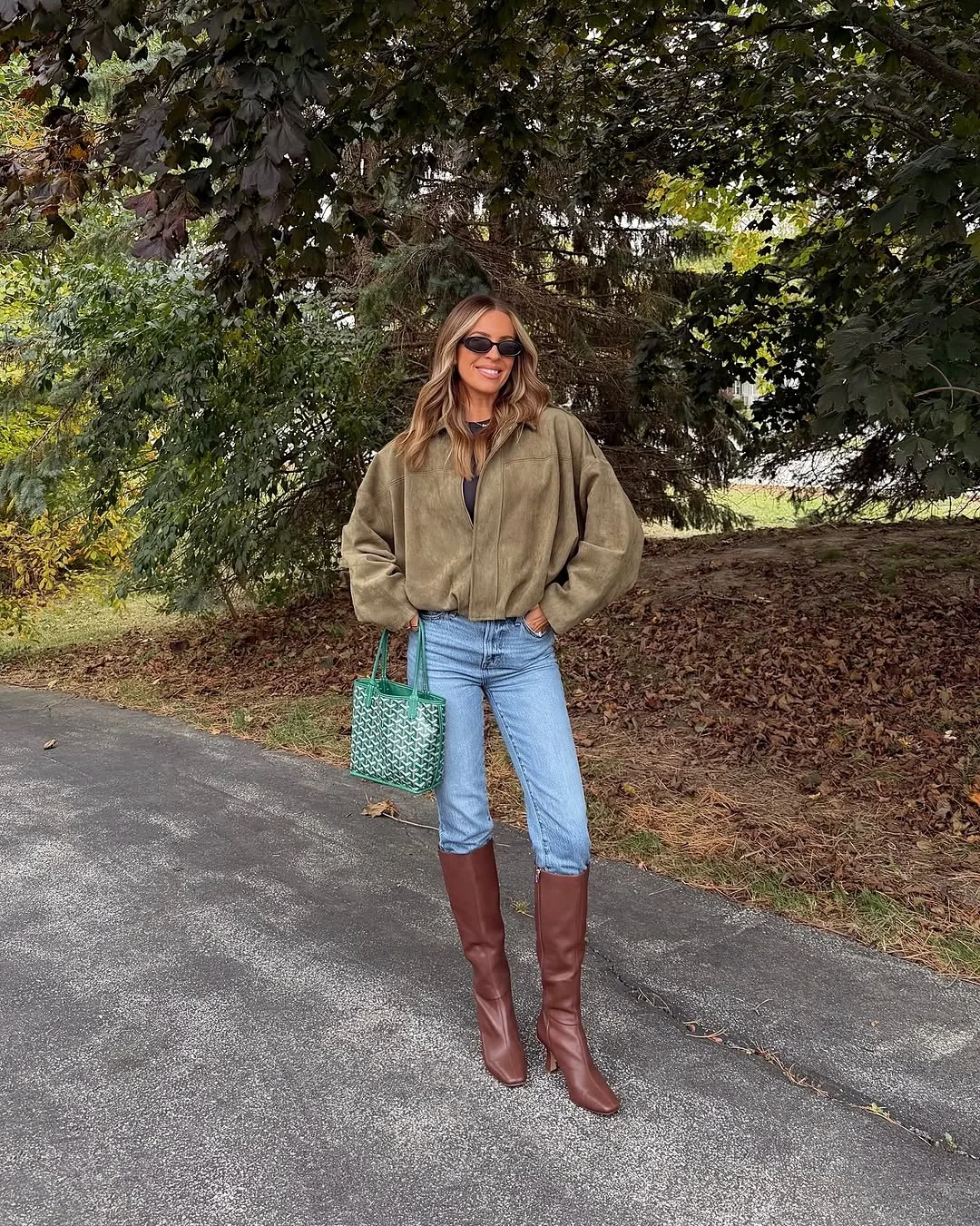 fall concert outfits 2026 Olive Suede And Riding Boots For An Outdoor Concert Night