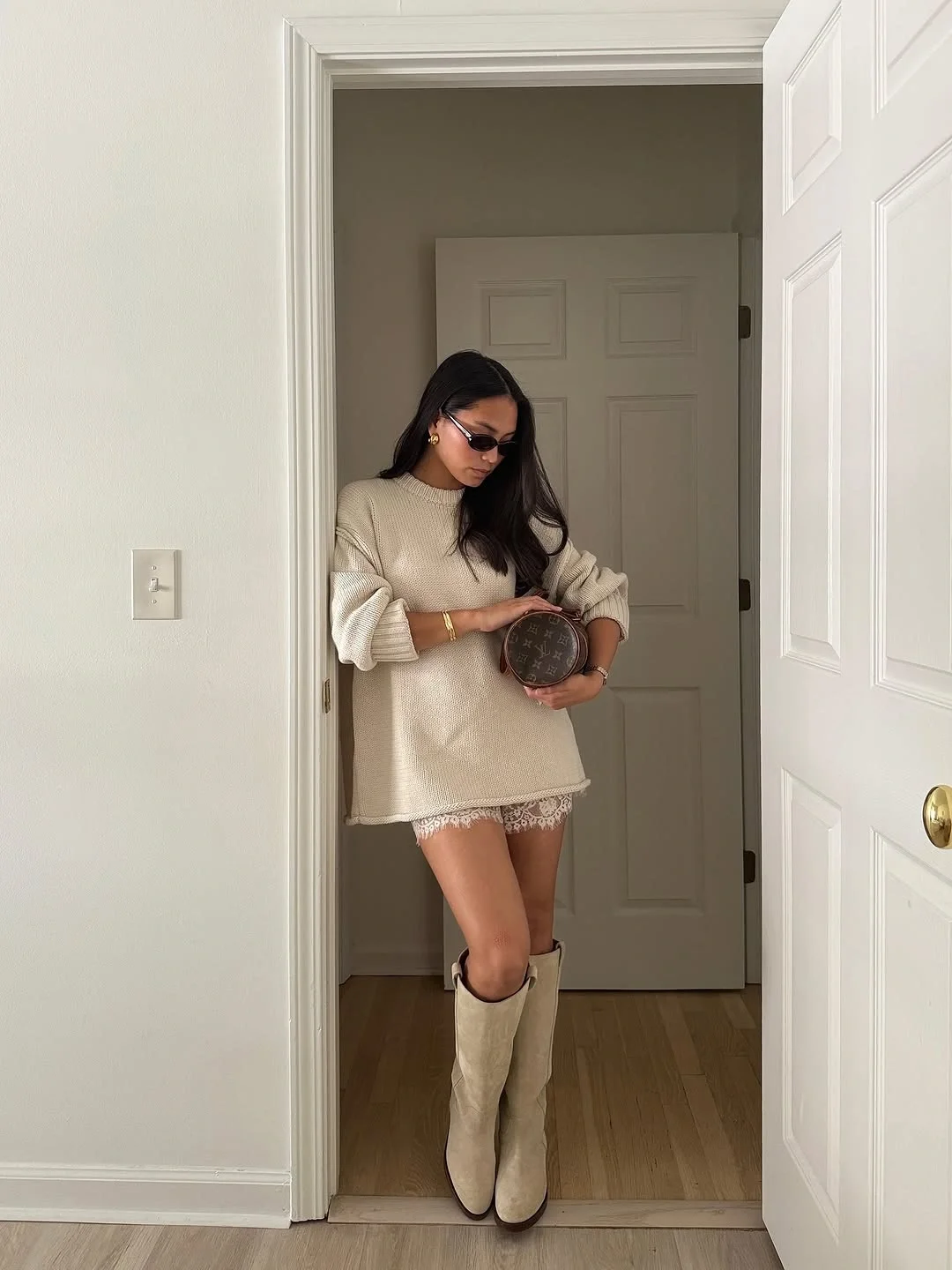 fall concert outfits 2026 Cream Knit And Cowboy Boots For Early Fall Concerts