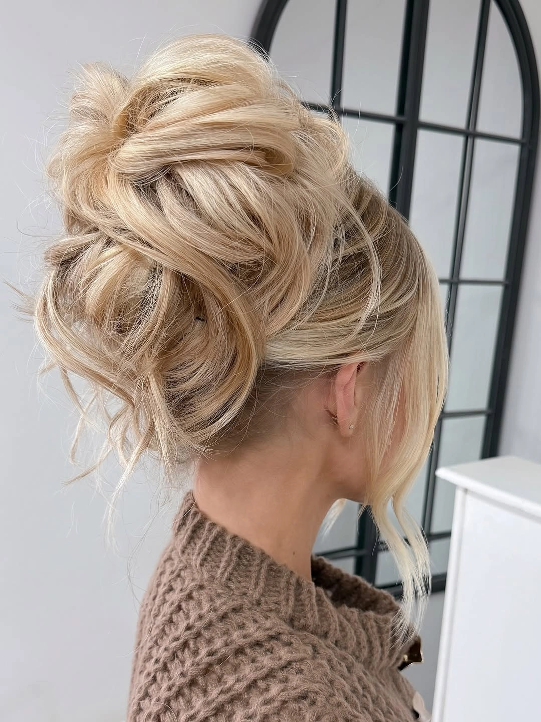 fall hairstyles for long hair 2026 Soft Textured Updo With Wispy Face Framing Pieces