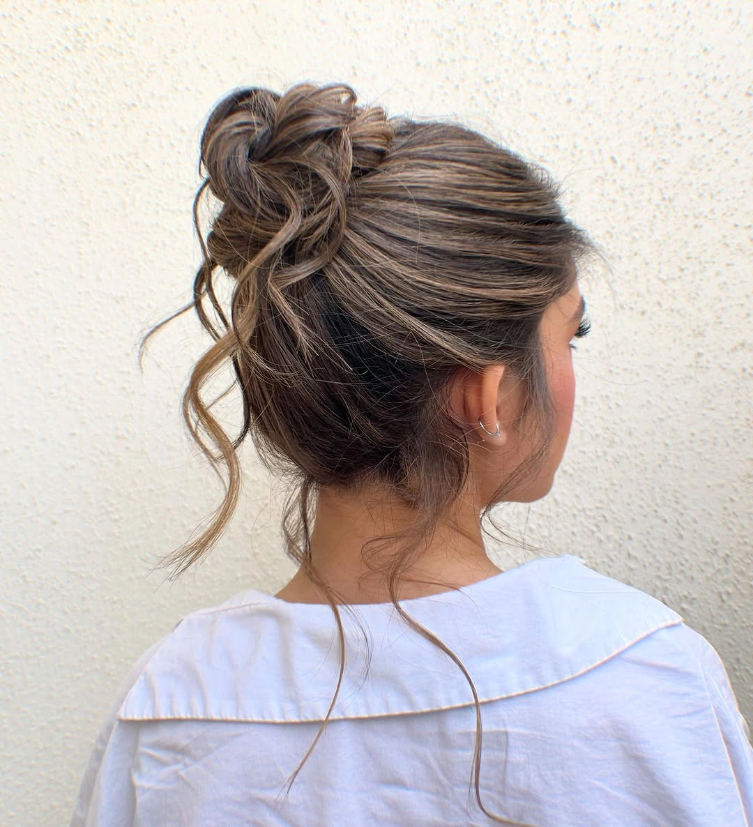 fall hairstyles for office 2026 The Relaxed Textured Bun That Never Feels Overdone
