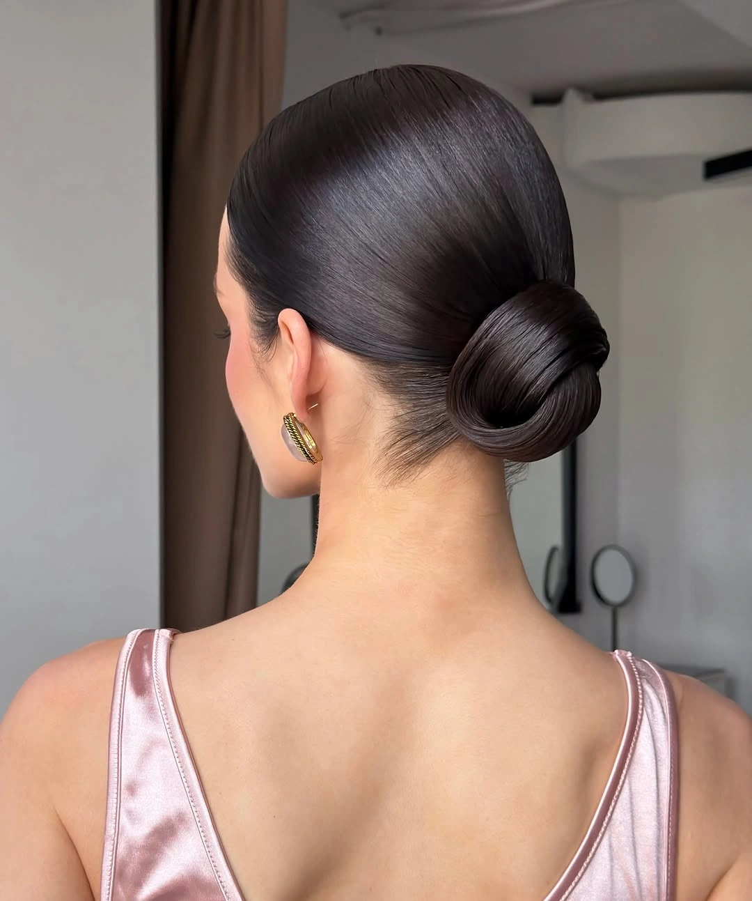 fall hairstyles for office 2026 Minimalist Sleek Low Knot