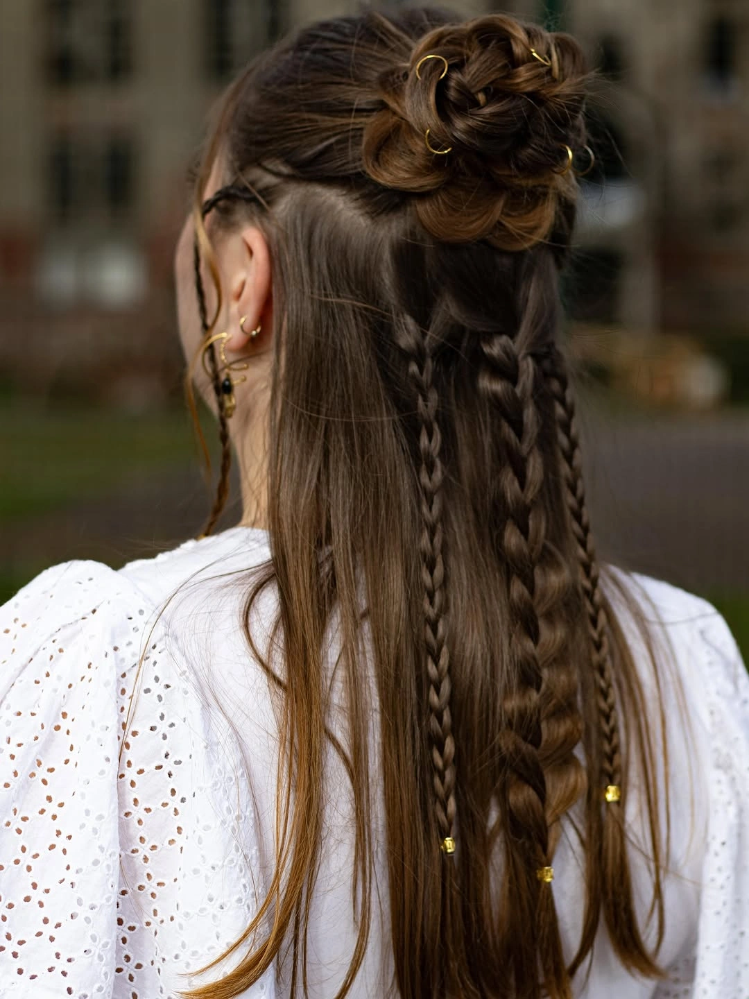 fall hairstyles for office 2026 Half-Up Braided Bun With Creative Detail