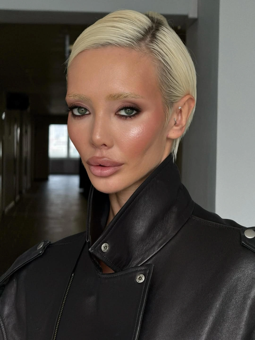 fall hairstyles for short hair 2026 Ultra Sleek Platinum Pixie With Side Part