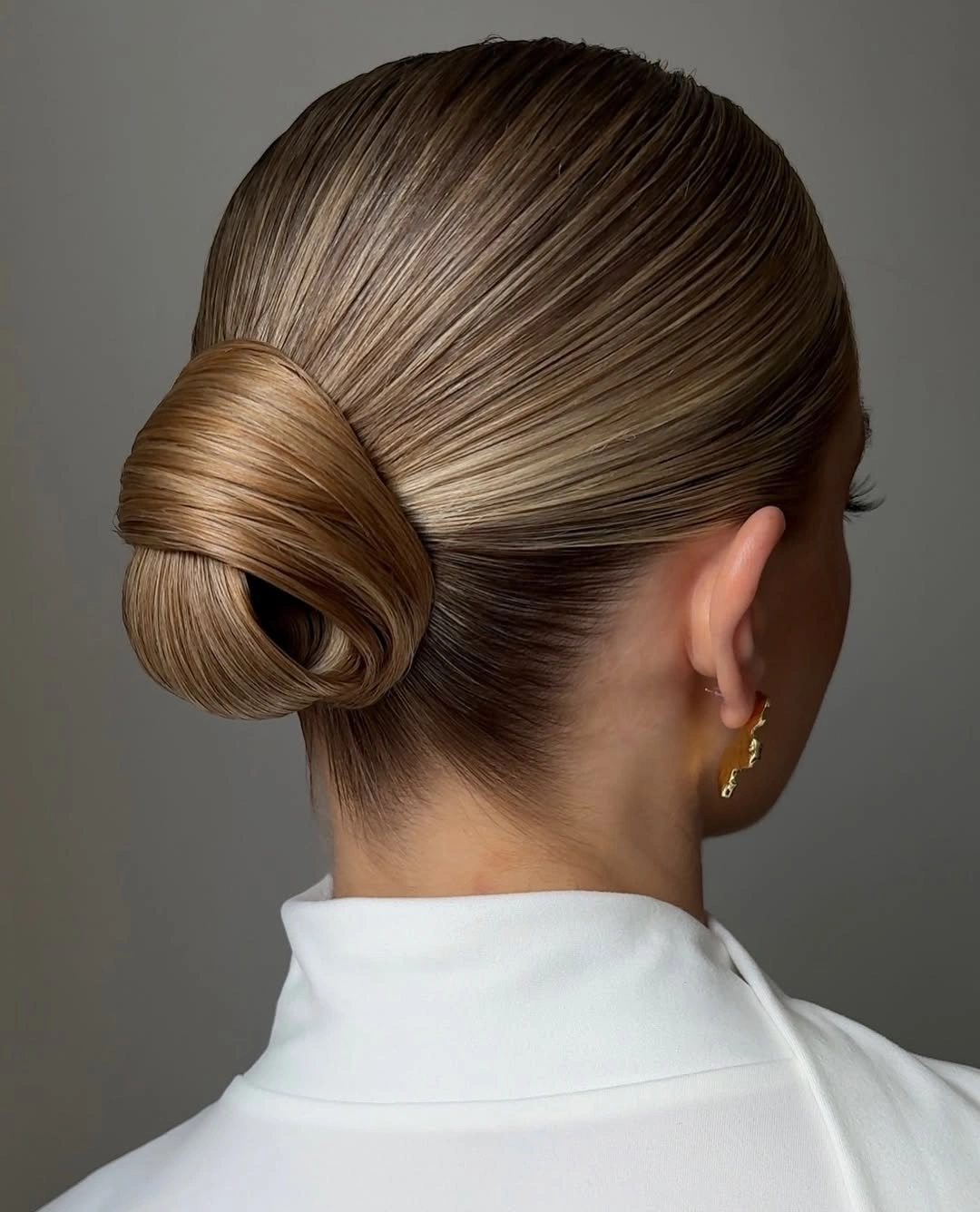 fall hairstyles for short hair 2026 Modern Wrapped Bun For Every Occasion