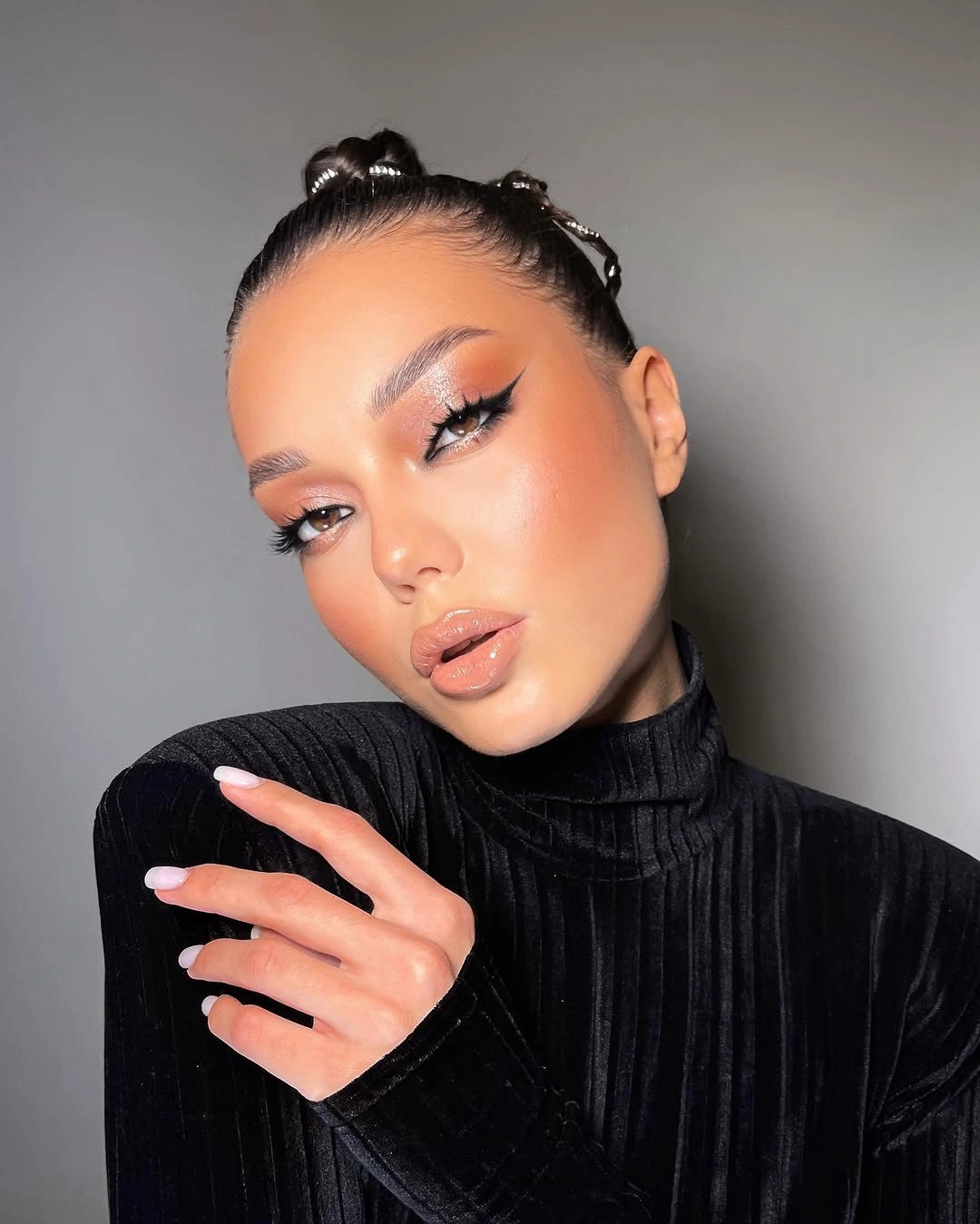 fall hairstyles for short hair 2026 Playful Mini Bun Y2K Look