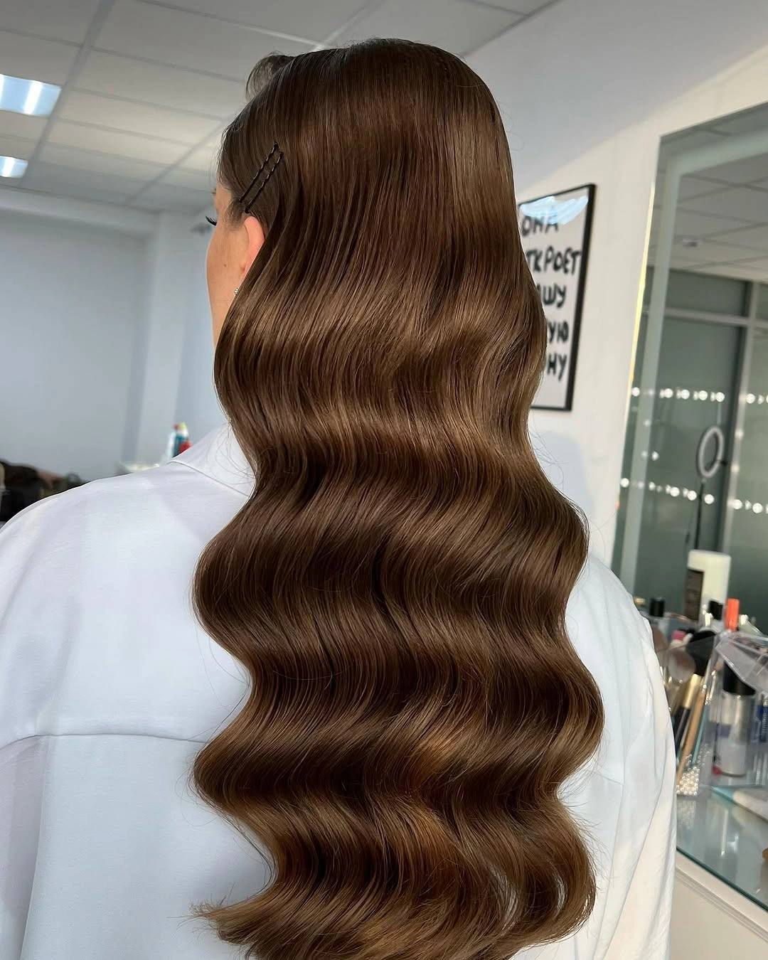 fall hairstyles for wedding guests 2026 Glossy Hollywood Waves With Timeless Sophistication