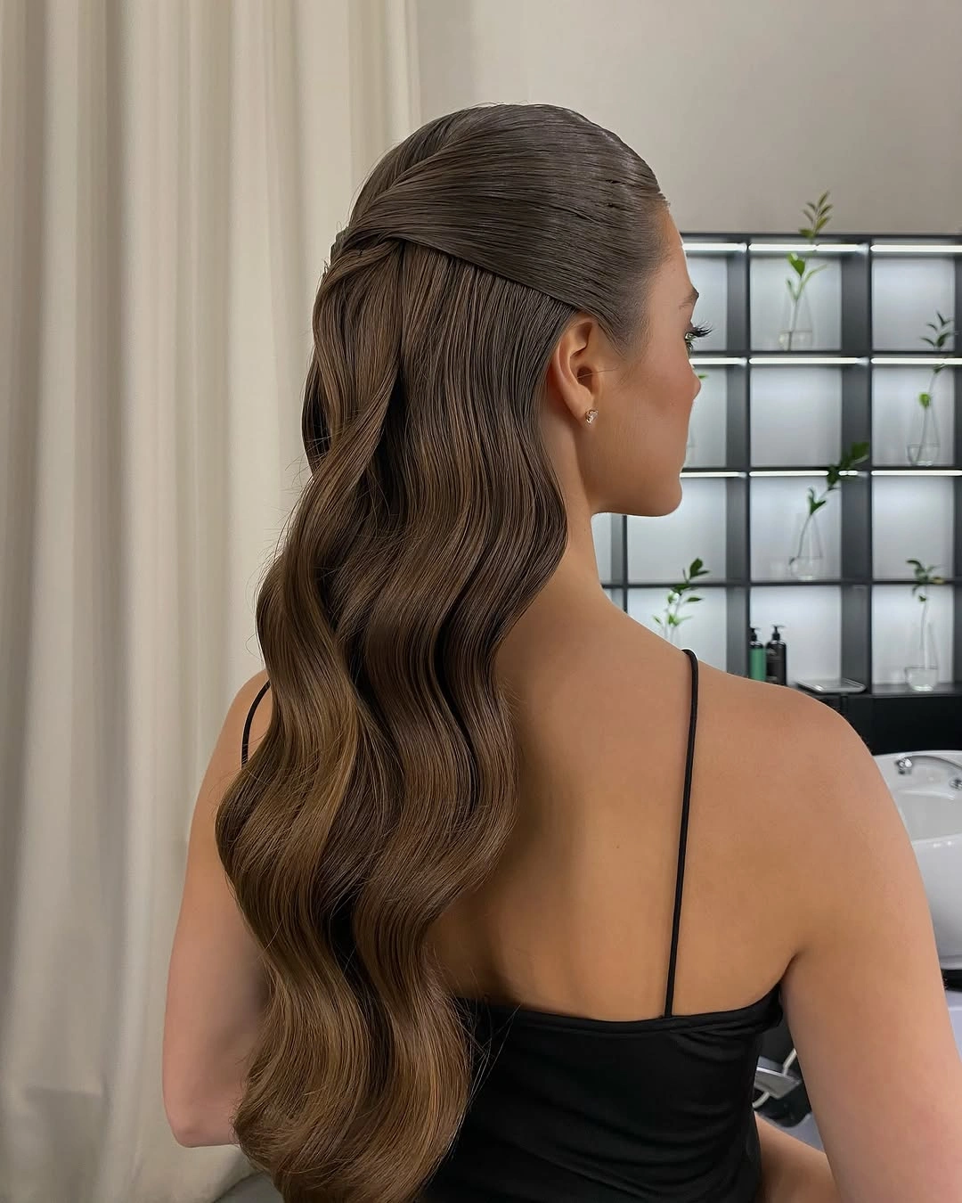 fall hairstyles for wedding guests 2026 Sleek Half Up Waves With Modern Elegance