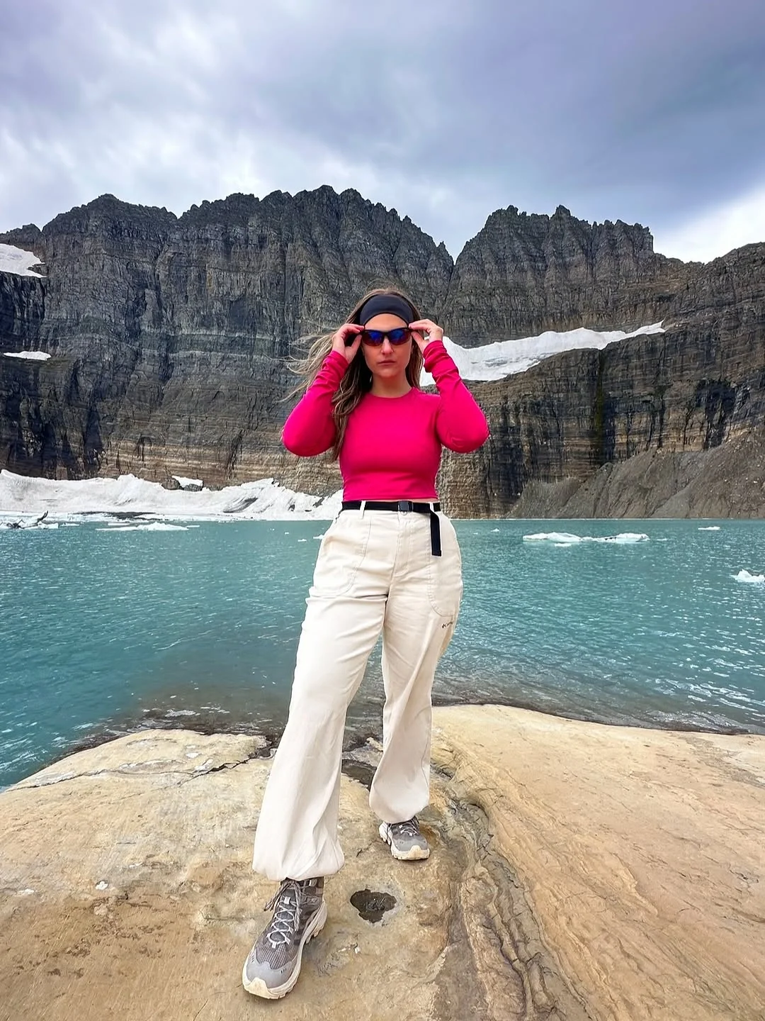 fall hiking outfits 2026 Bold Color Against Alpine Water Views