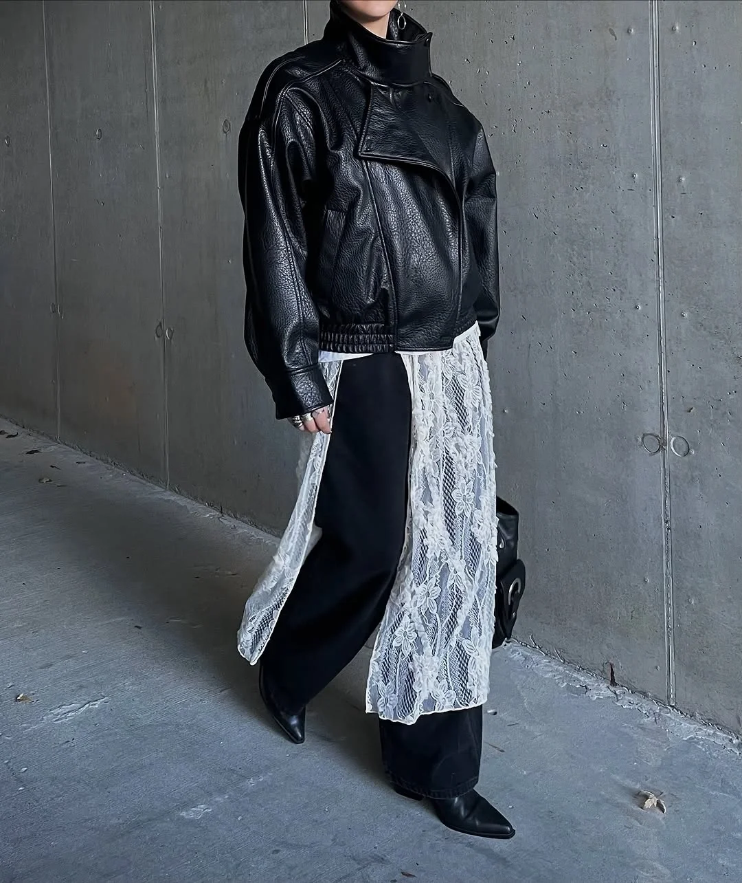 fall outfits with ankle boots 2026 Romantic Lace Layers Give Black Leather a Softer Edge