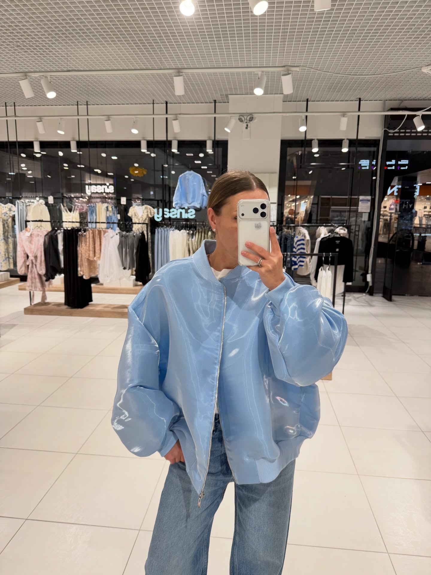 fall outfits with bombers 2026 Glossy Blue Bombers Bring A Playful Twist To Fall Street Style