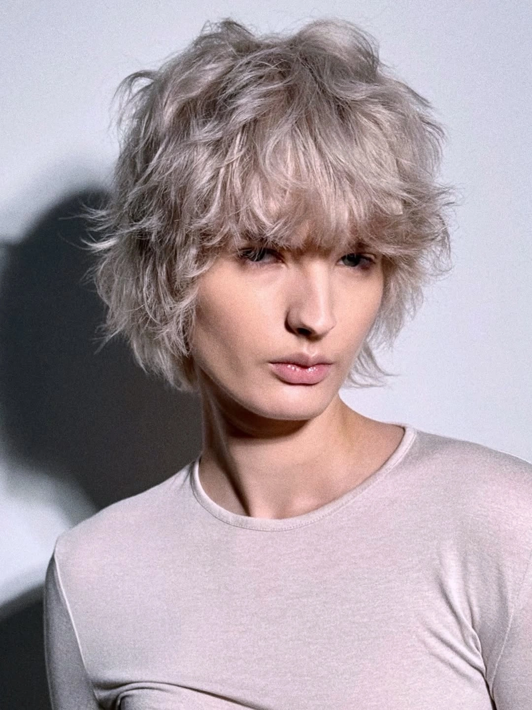 fall pixie haircut ideas 2026 Soft Feathered Pixie With Airy Volume