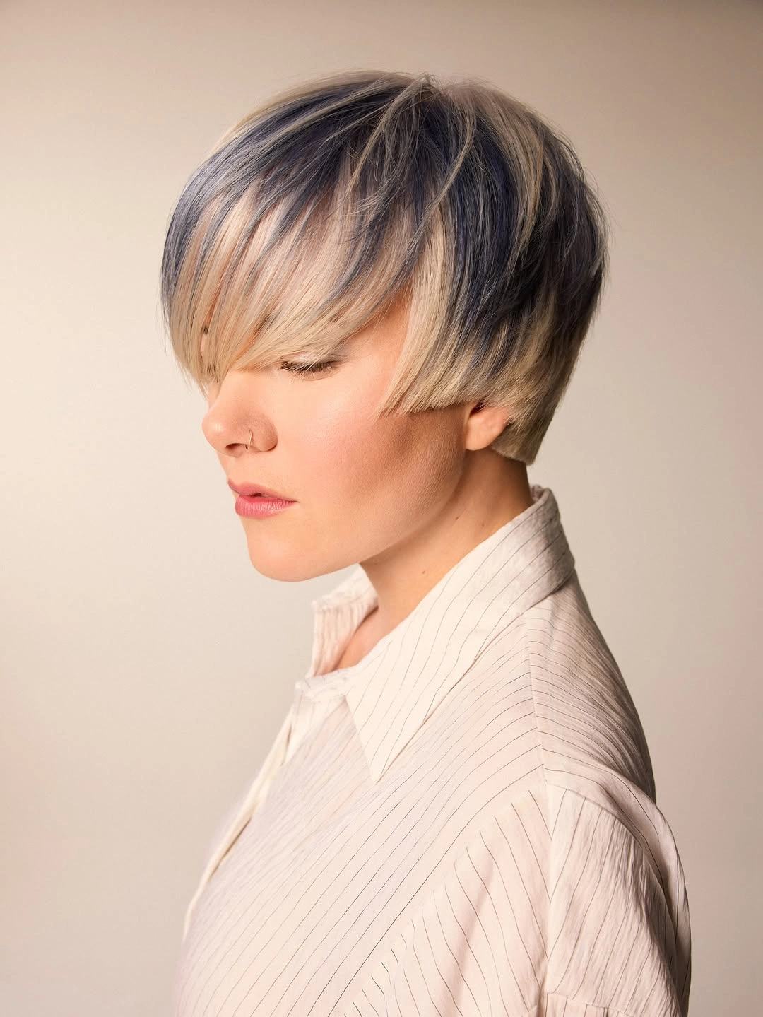 fall pixie haircut ideas 2026 Elegant Side Swept Pixie With Dimensional Blonde