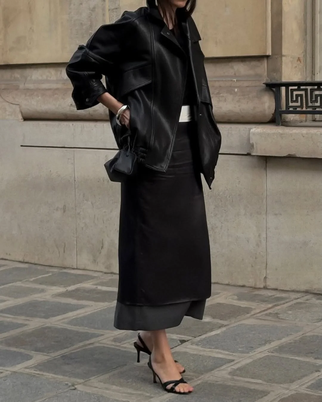 leather jacket outfits women 2026 The Classy Leather Jacket That Elevates a Midi Skirt