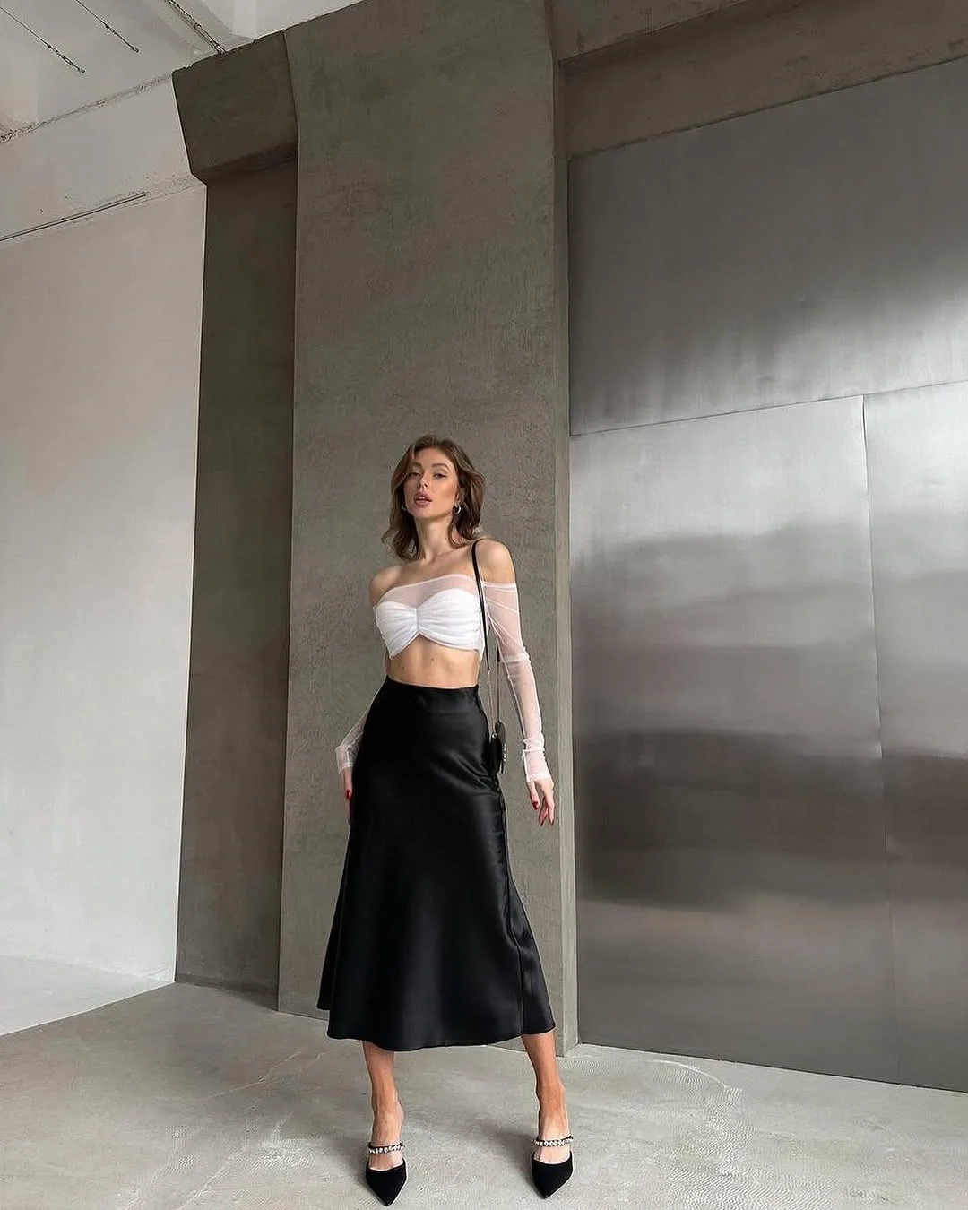 midi skirt fall outfit 2026 Black Satin Creates an Effortless Evening Statement