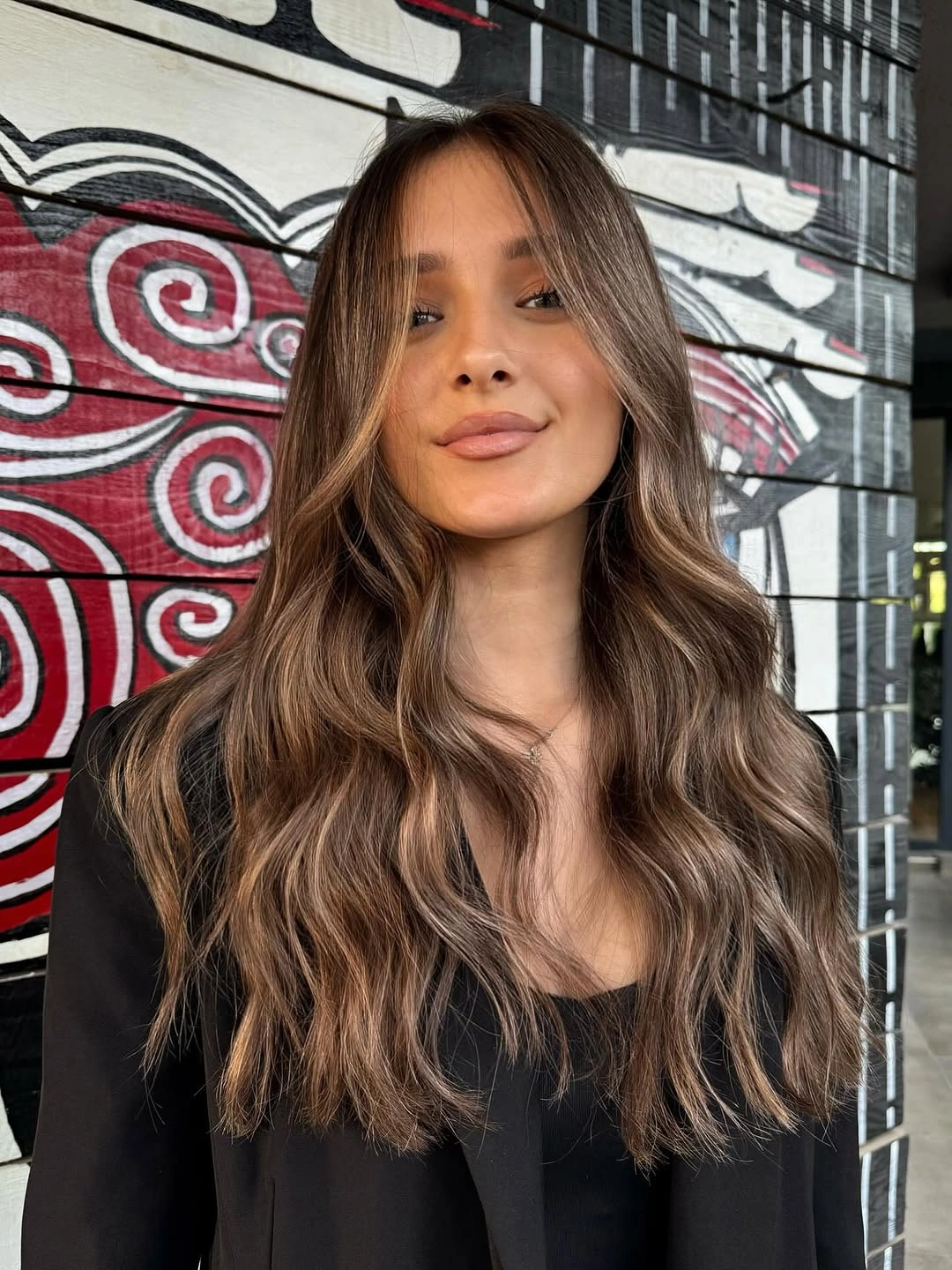 modern hair lowlights: color ideas and inspiration Rich Espresso Waves with Delicate Caramel Lowlights
