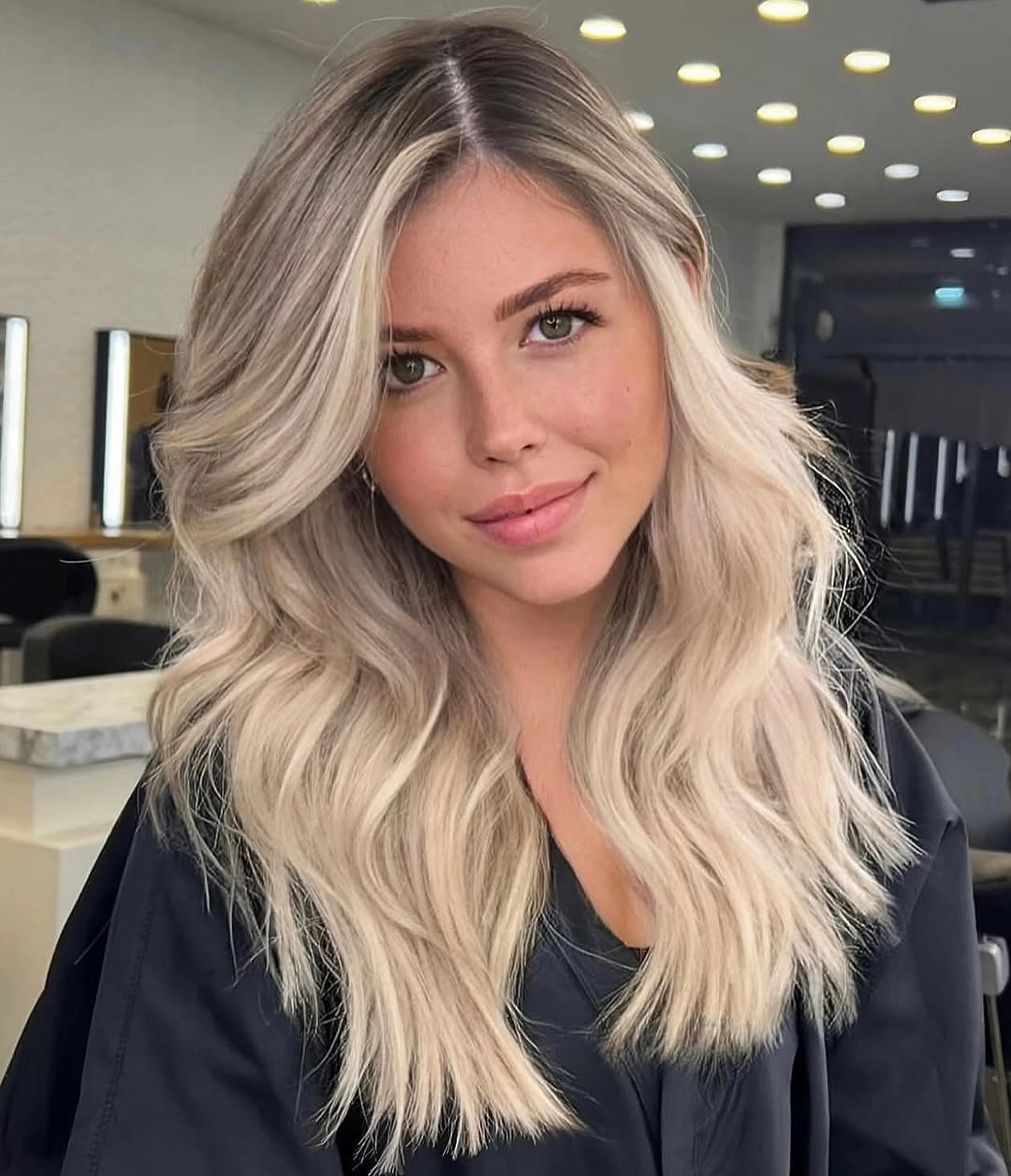 stylish babylights hair ideas Bright Blonde Babylights with a Lived-In Shadow Root