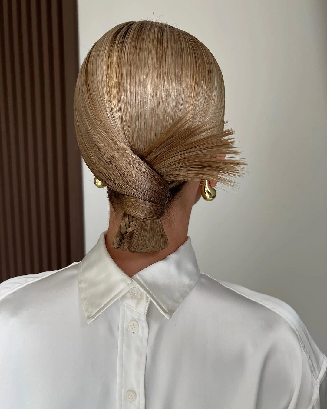stylish bridesmaid hairstyling Minimalist Low Twist with Couture Appeal