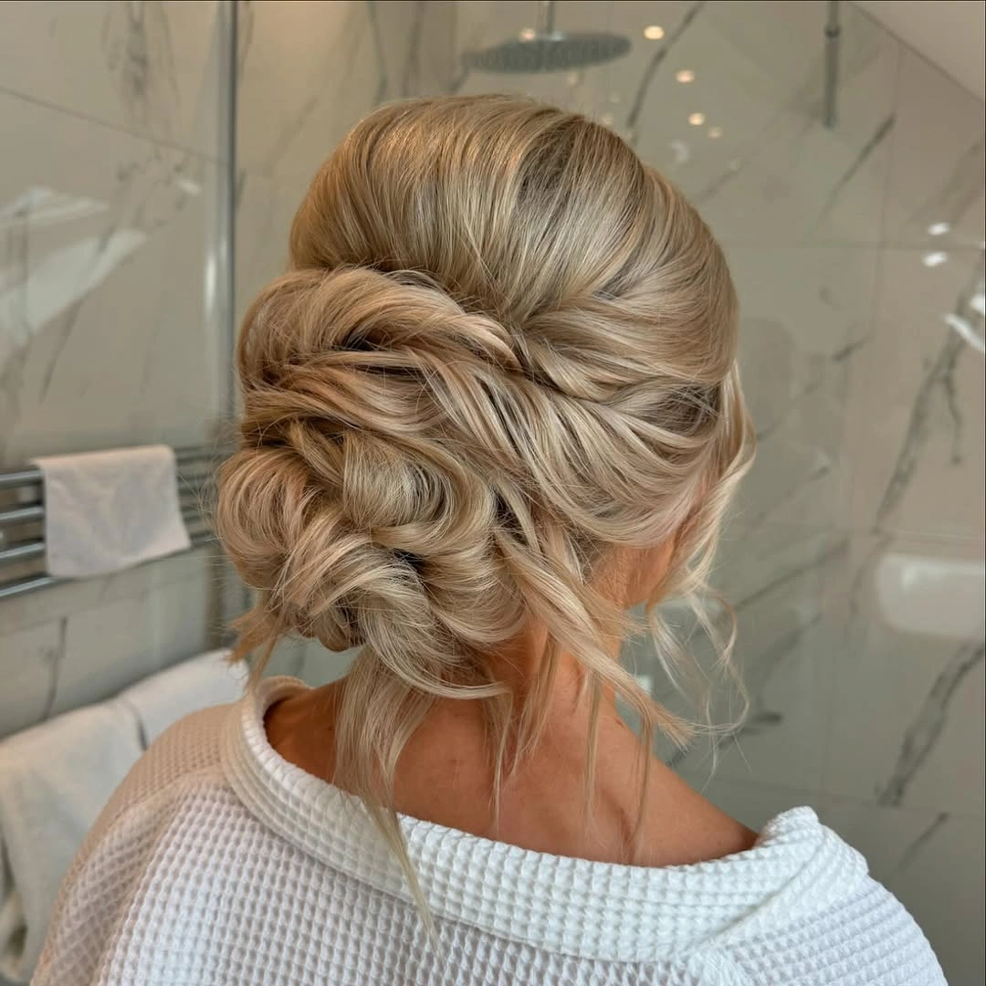 stylish bridesmaid hairstyling Soft Textured Bridal Bun