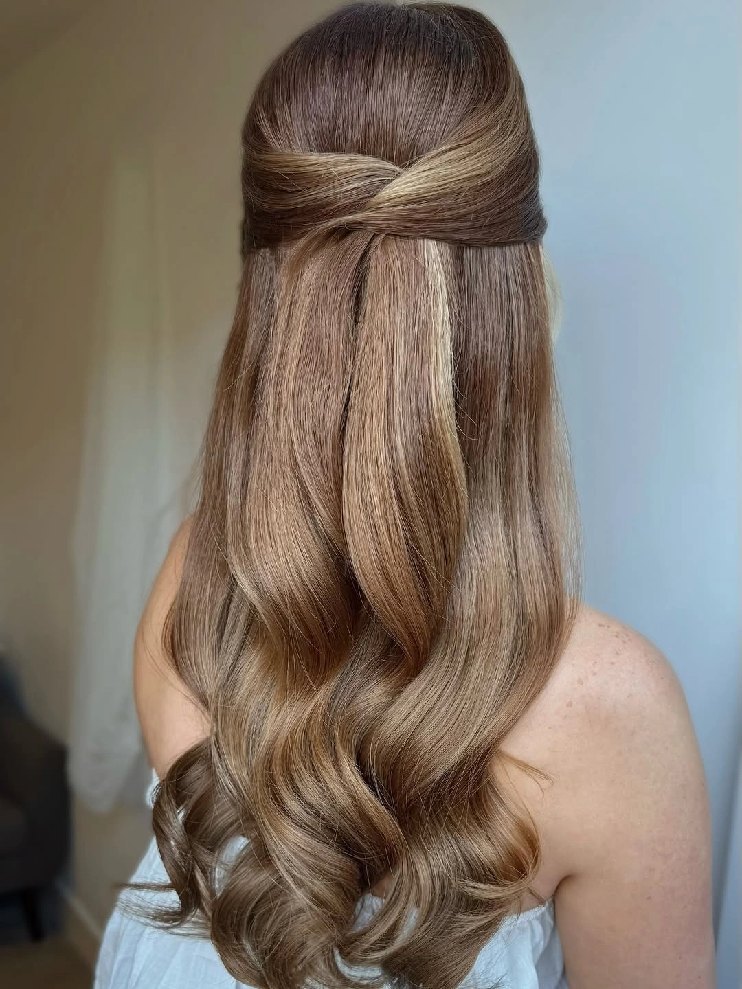 stylish bridesmaid hairstyling Classic Half Up Style with Soft Waves