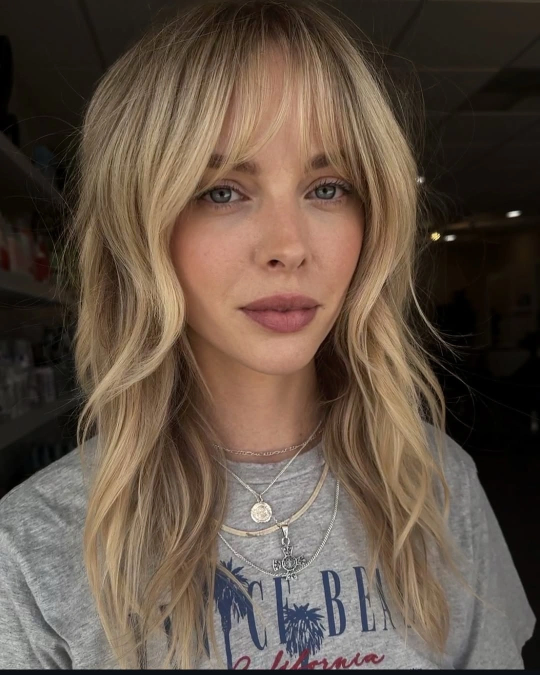 stylish choppy medium layered hair Soft Airy Layers With Feathered Curtain Bangs