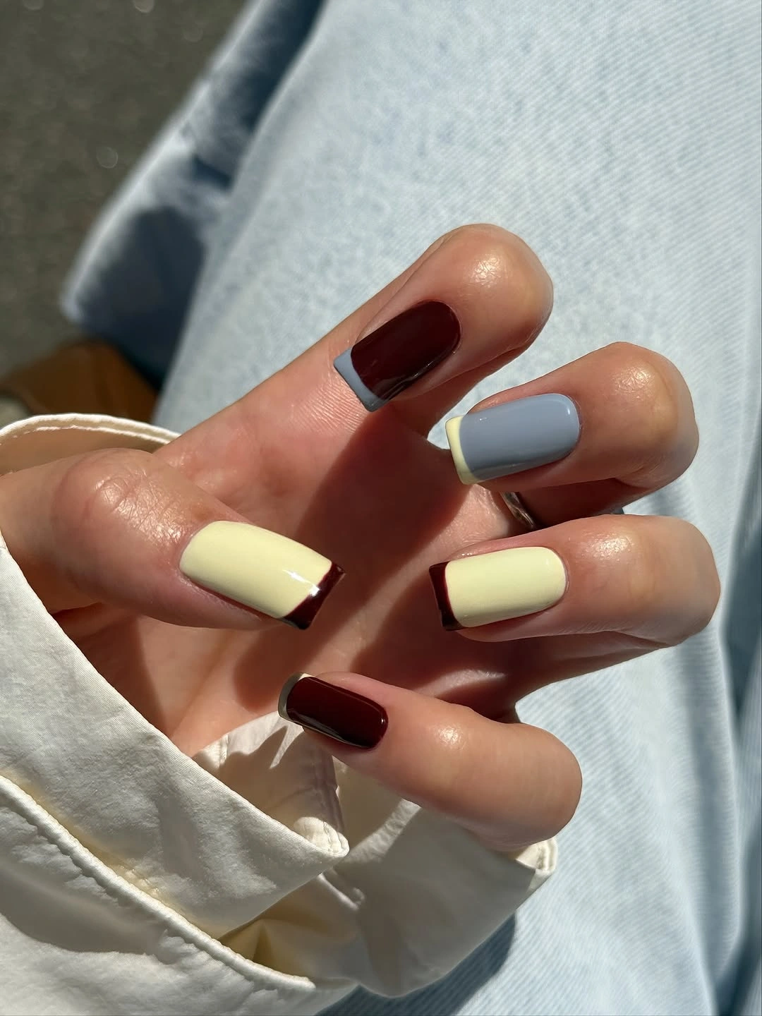 stylish fall medium nail ideas 2026 Modern Color Block French With Cozy Autumn Contrast