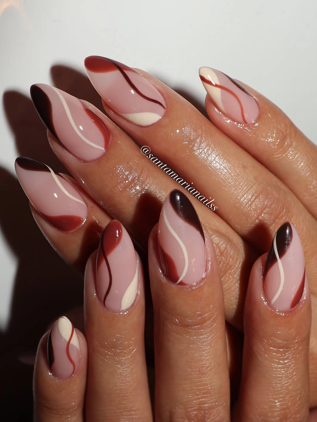 stylish fall medium nail ideas 2026 Flowing Mocha Abstract Nail Design