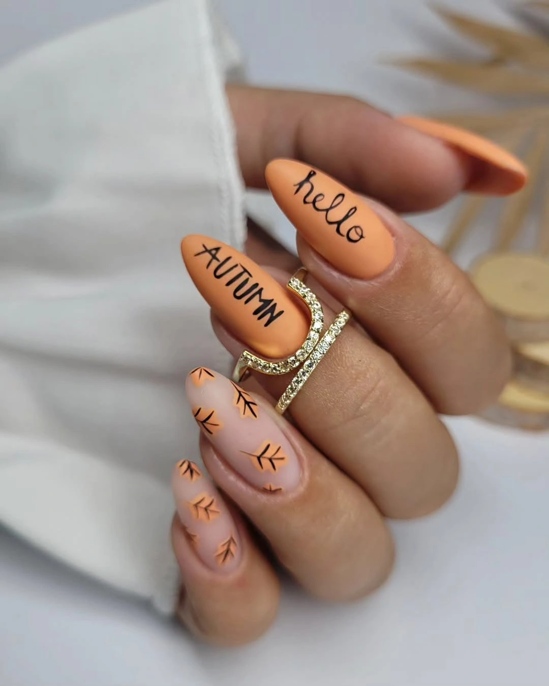 stylish fall nail art 2026 Matte Pumpkin Spice Lettering with Playful Autumn Charm