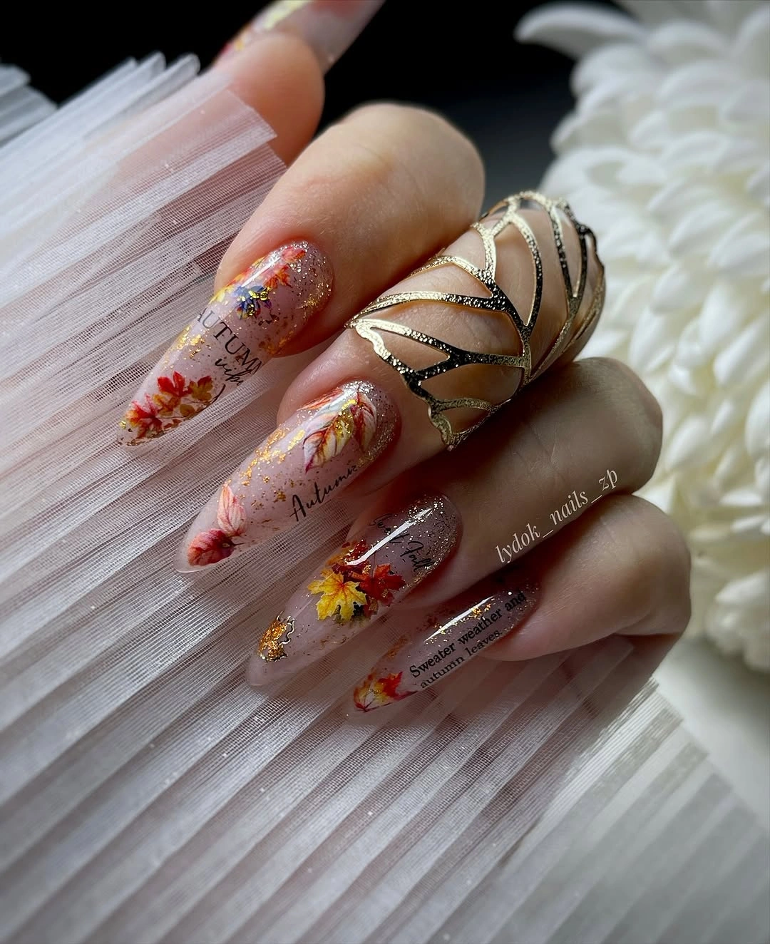 stylish fall nail art 2026 Pressed Autumn Leaves With Golden Sparkle
