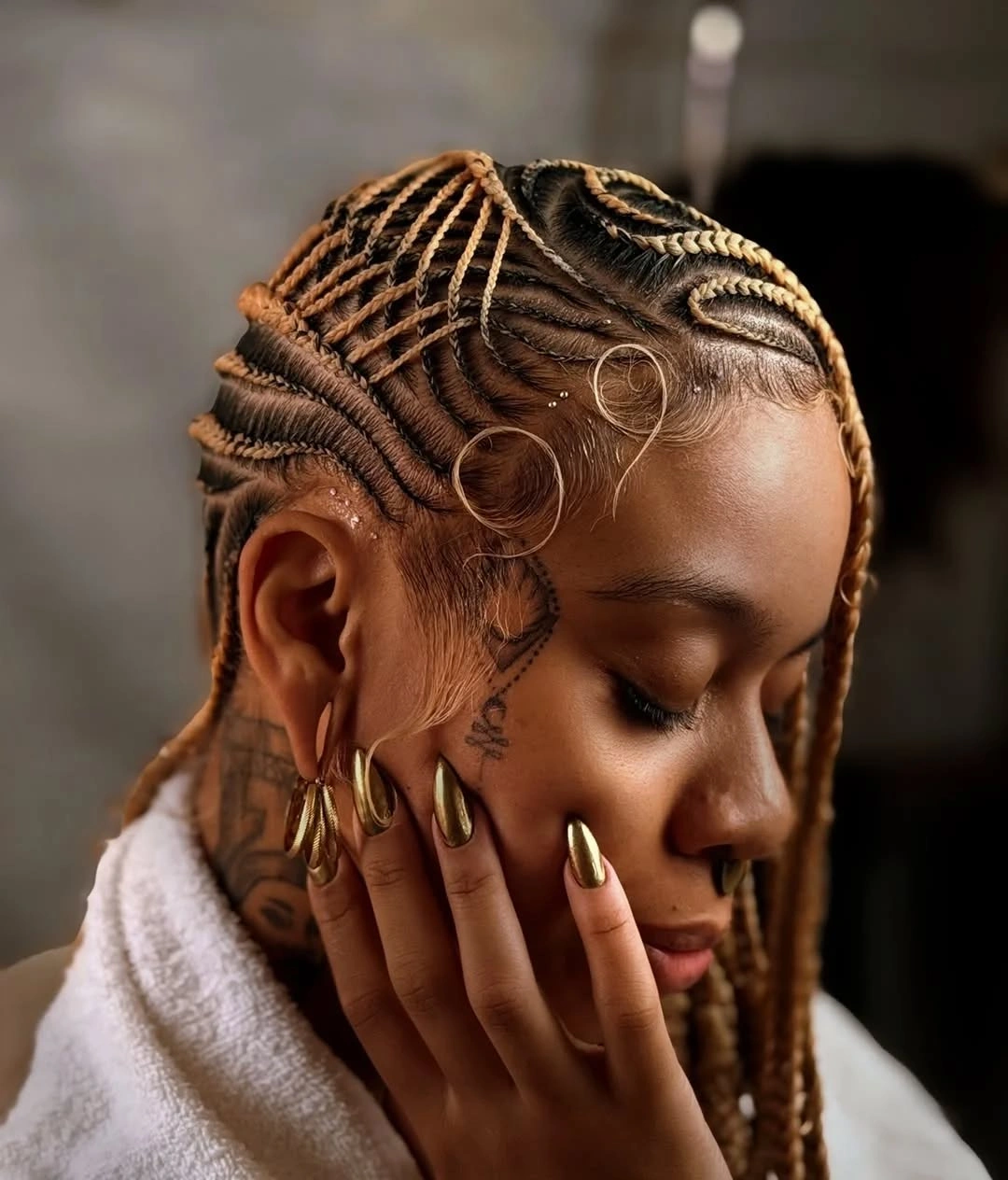 stylish lemonade braid hairstyle Golden Accents Meet Artistic Braided Designs