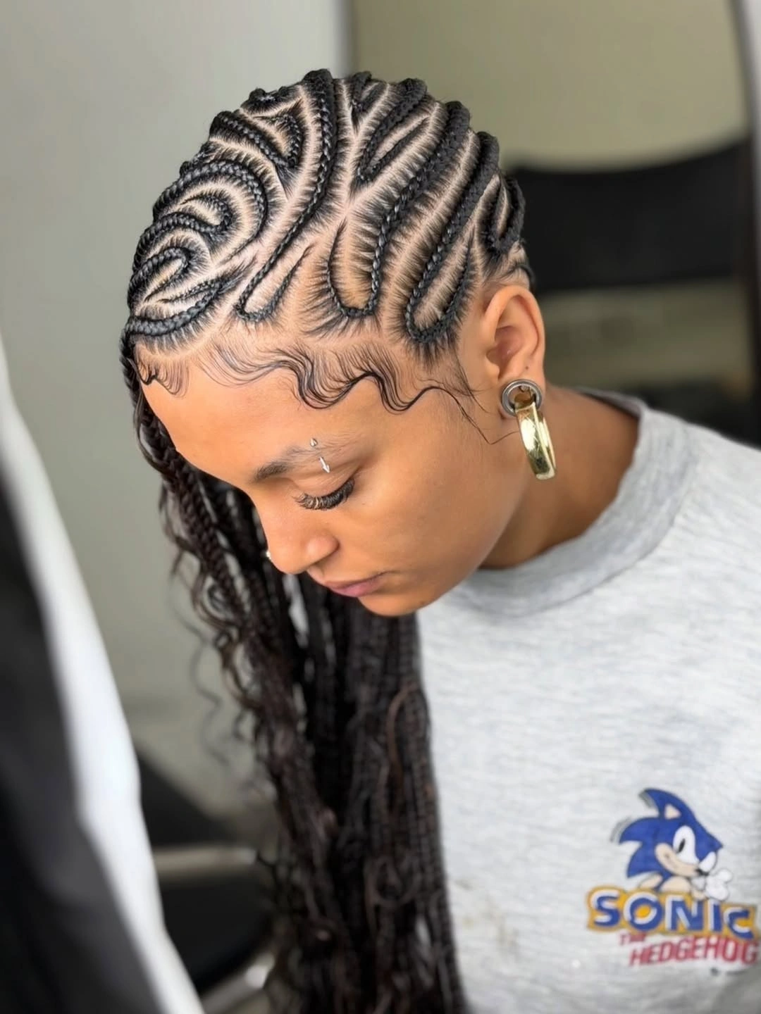 stylish lemonade braid hairstyle Creative Swirl Designs with Artistic Texture