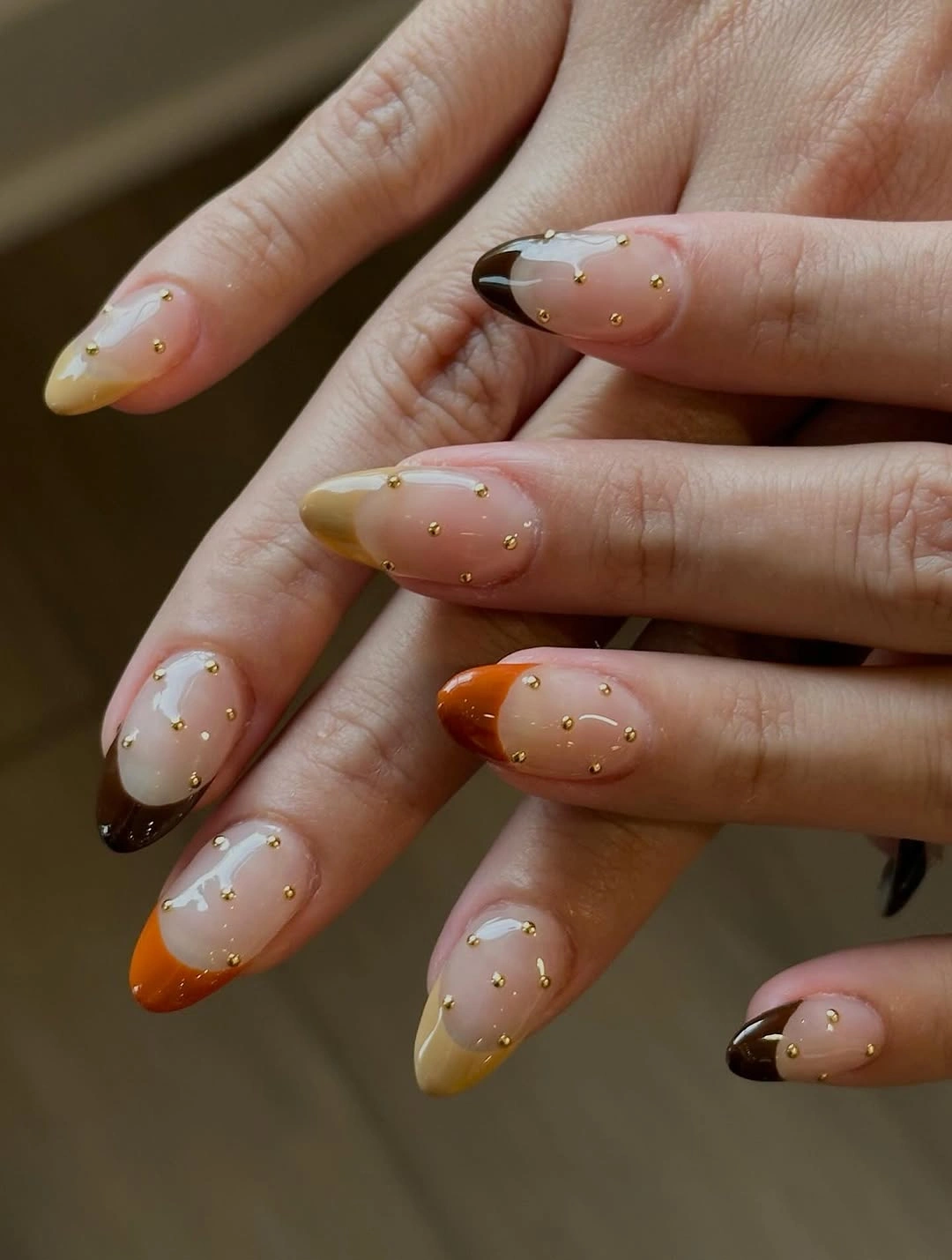 stylish september nail designs 2026 Minimalist Autumn French With Golden Studs