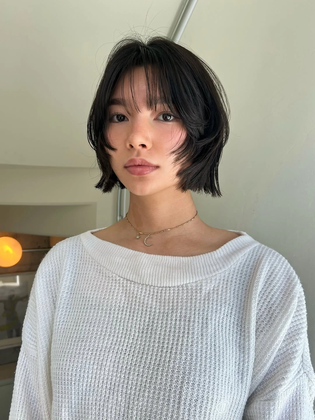 stylish short bobbed hairstyle Layered Bob With Wispy Curtain Bangs