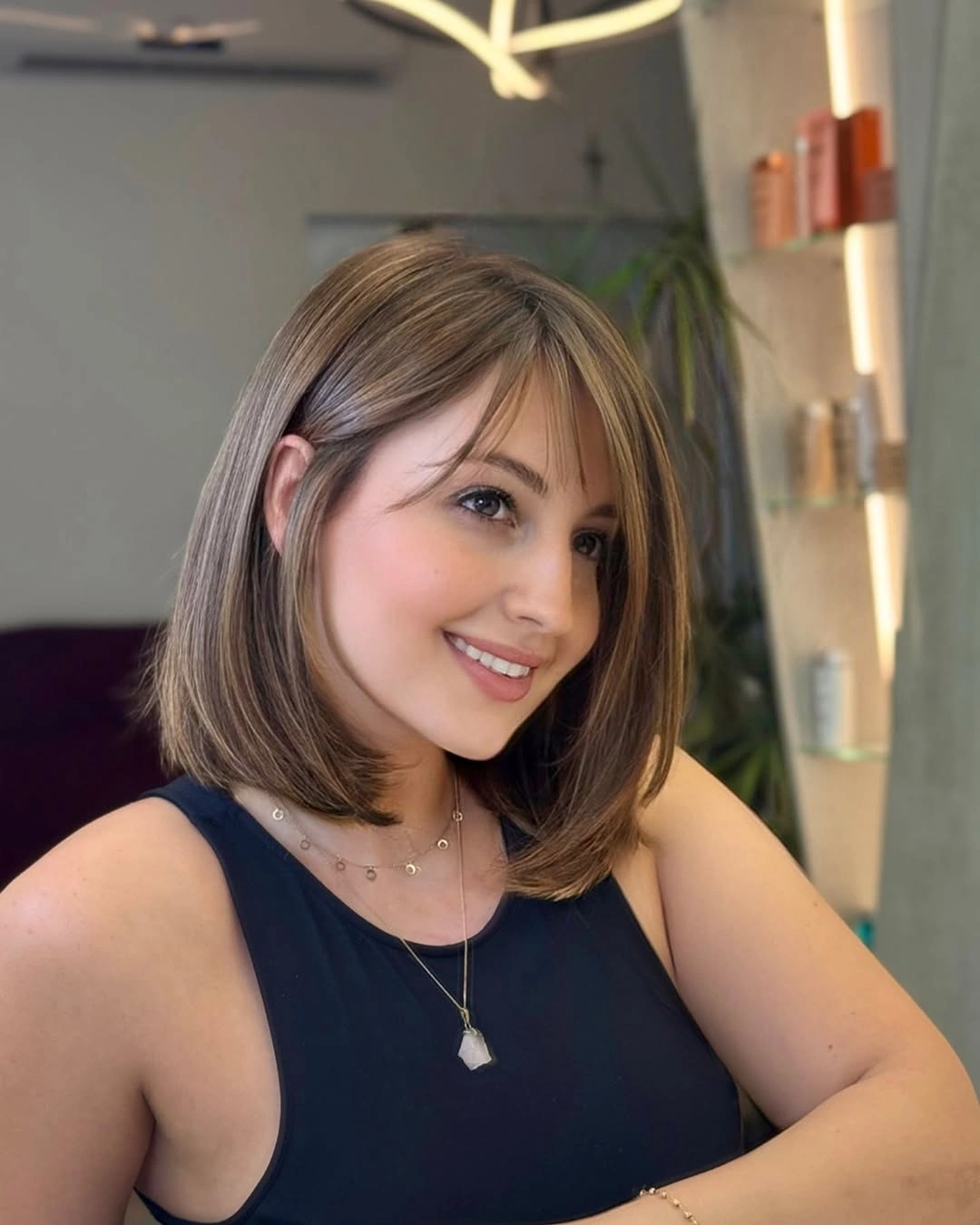 stylish short bobbed hairstyle Shoulder-Grazing Bob With Wispy Bangs And Soft Movement