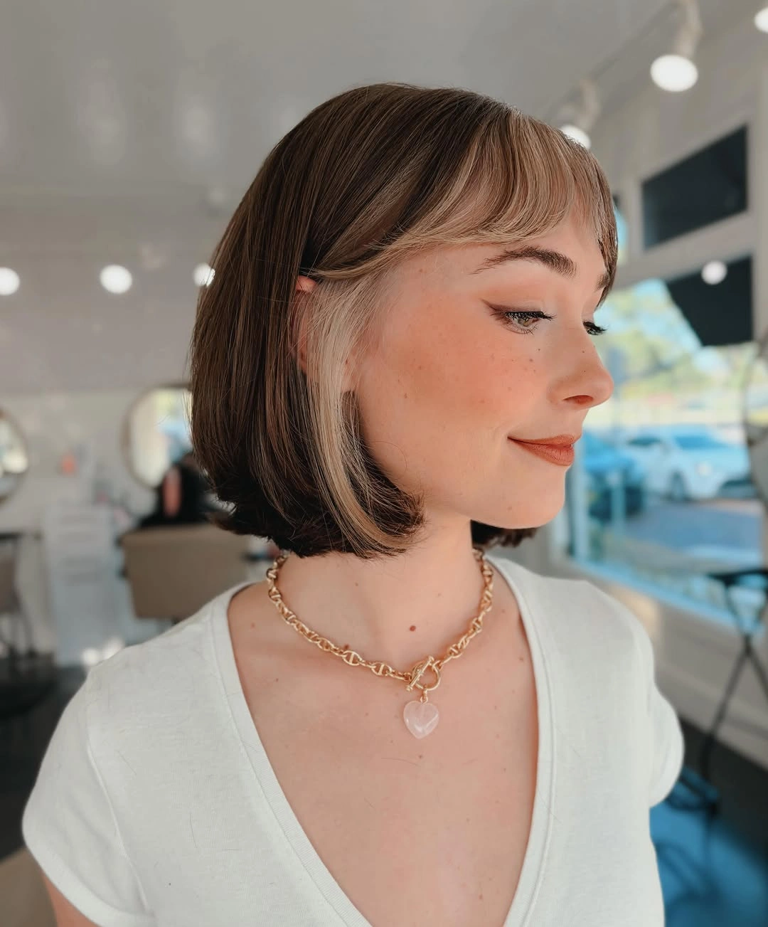 stylish short bobbed hairstyle Face Framing Bob With Bold Color Contrast
