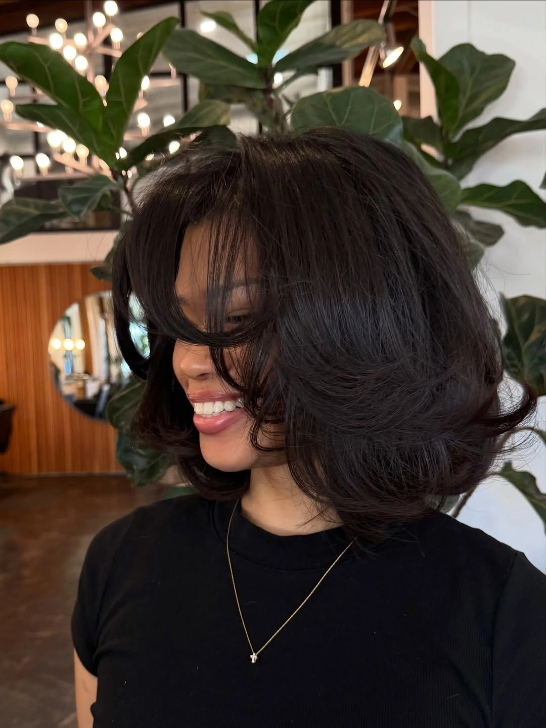 stylish short bobbed hairstyle Voluminous Layered Bob With Curtain Fringe