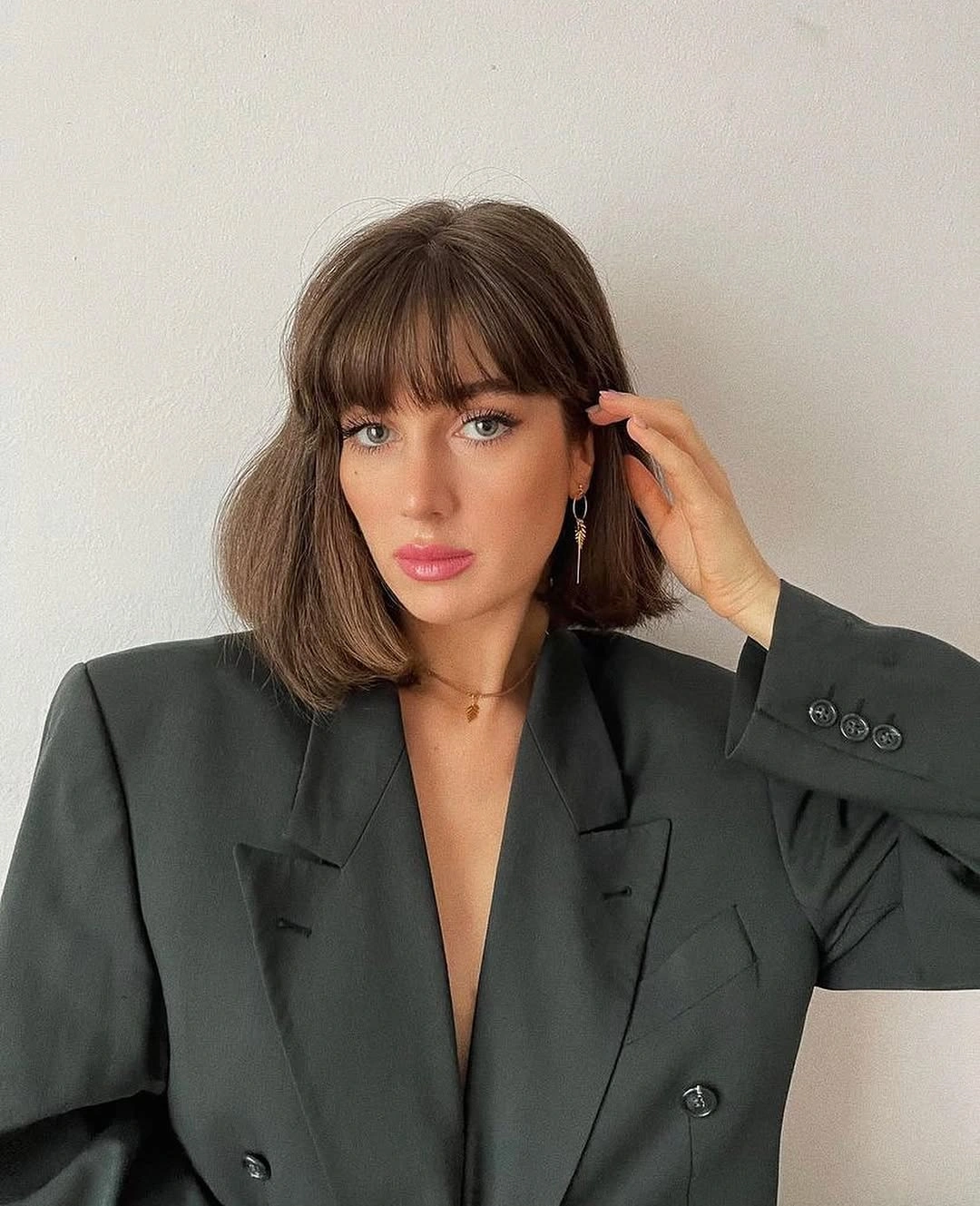 stylish short bobbed hairstyle Polished Bob With Soft Full Bangs