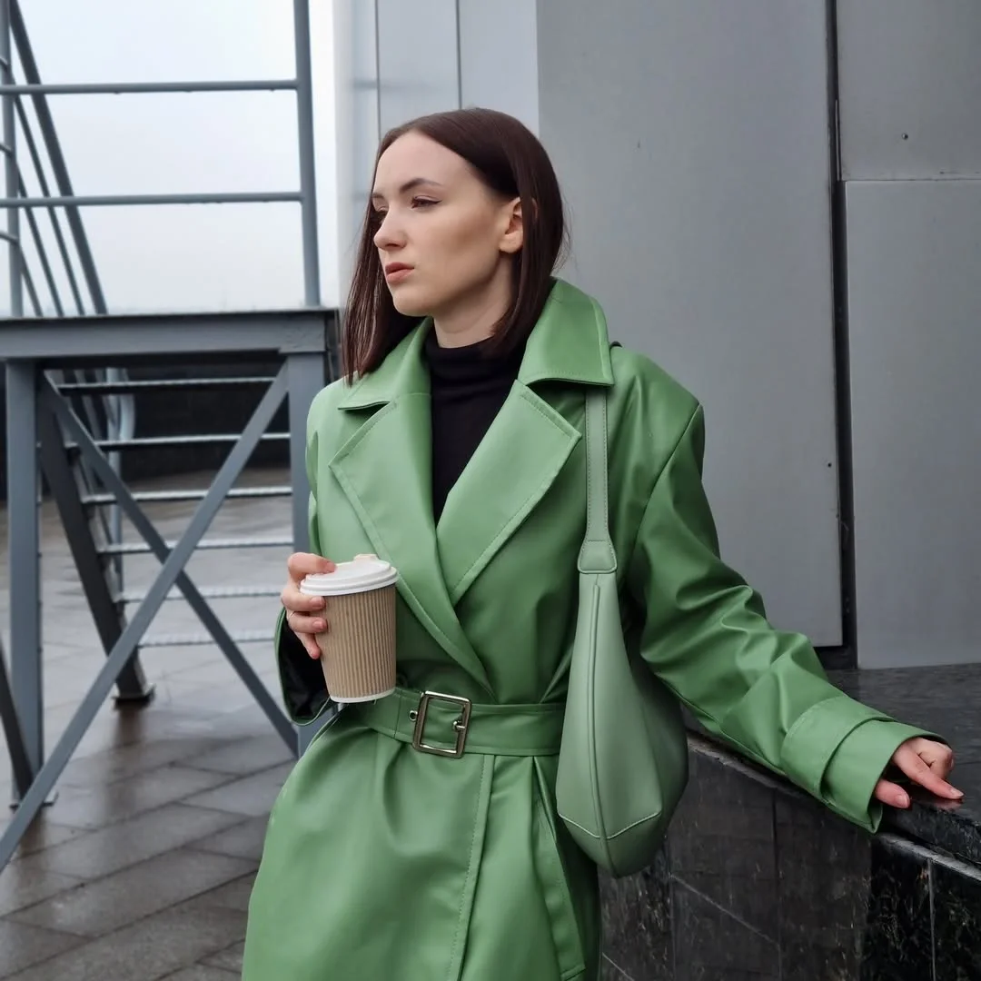 Trench coat fall outfits 2026 A Bold Green Leather Trench For Modern City Days