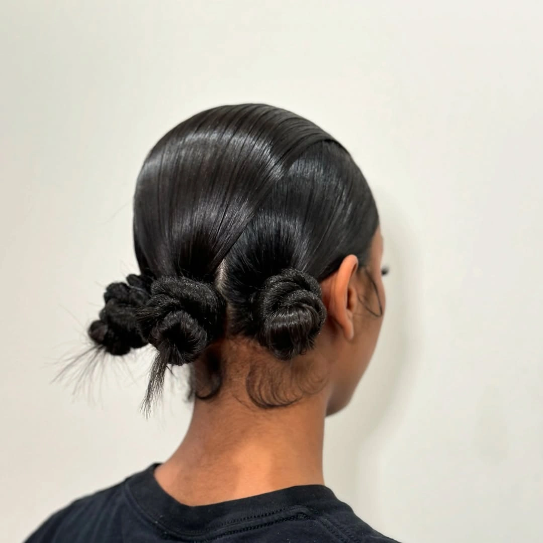 trendy bantu knots hairstyles Minimal Double Knots With a Sleek Low Finish