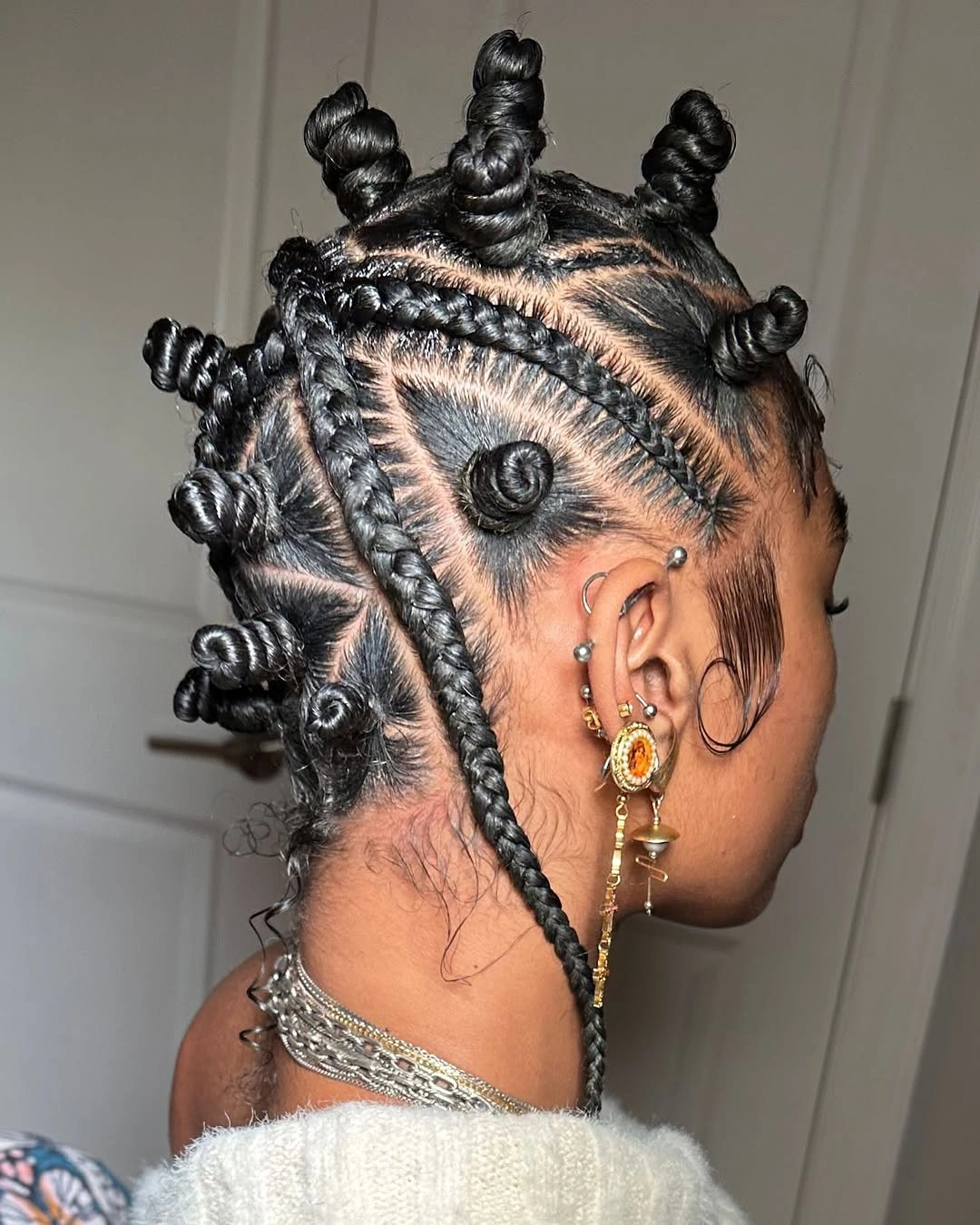 trendy bantu knots hairstyles Artistic Bantu Knot Pattern With Braided Details