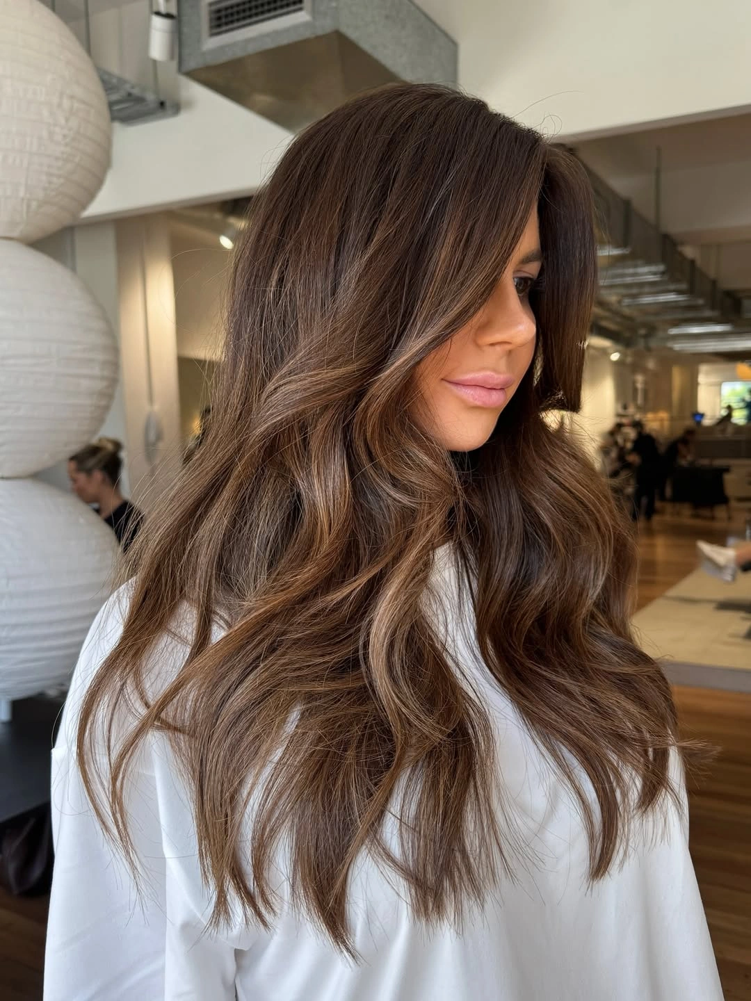 trendy dimensional brunette hair color Mocha Ribbon Highlights For Long Hair