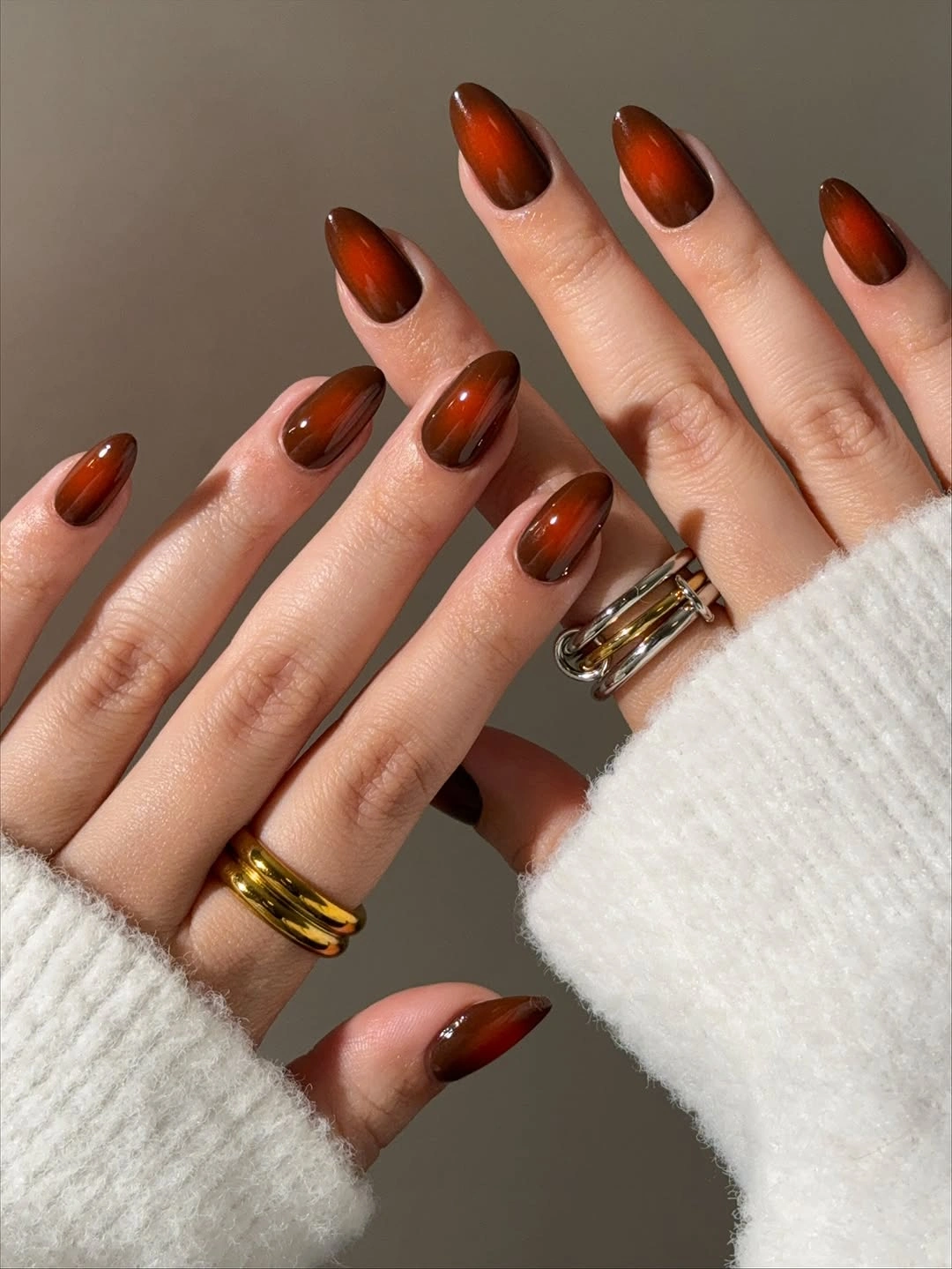 trendy fall almond nails 2026 Glossy Cinnamon Aura Almond Nails