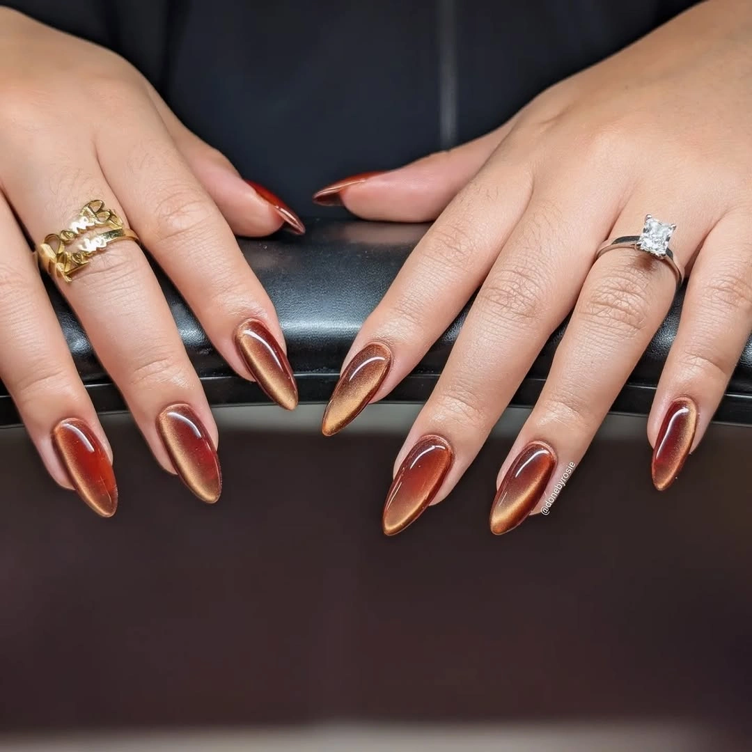 trendy fall almond nails 2026 Molten Copper Cat Eye Elegance