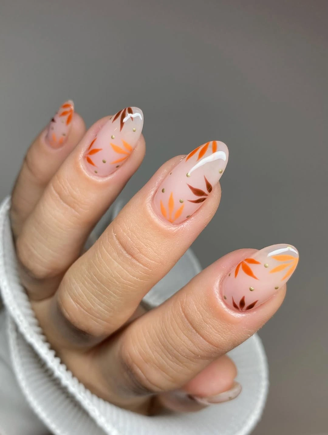 trendy fall almond nails 2026 Delicate Autumn Leaf Minimalism
